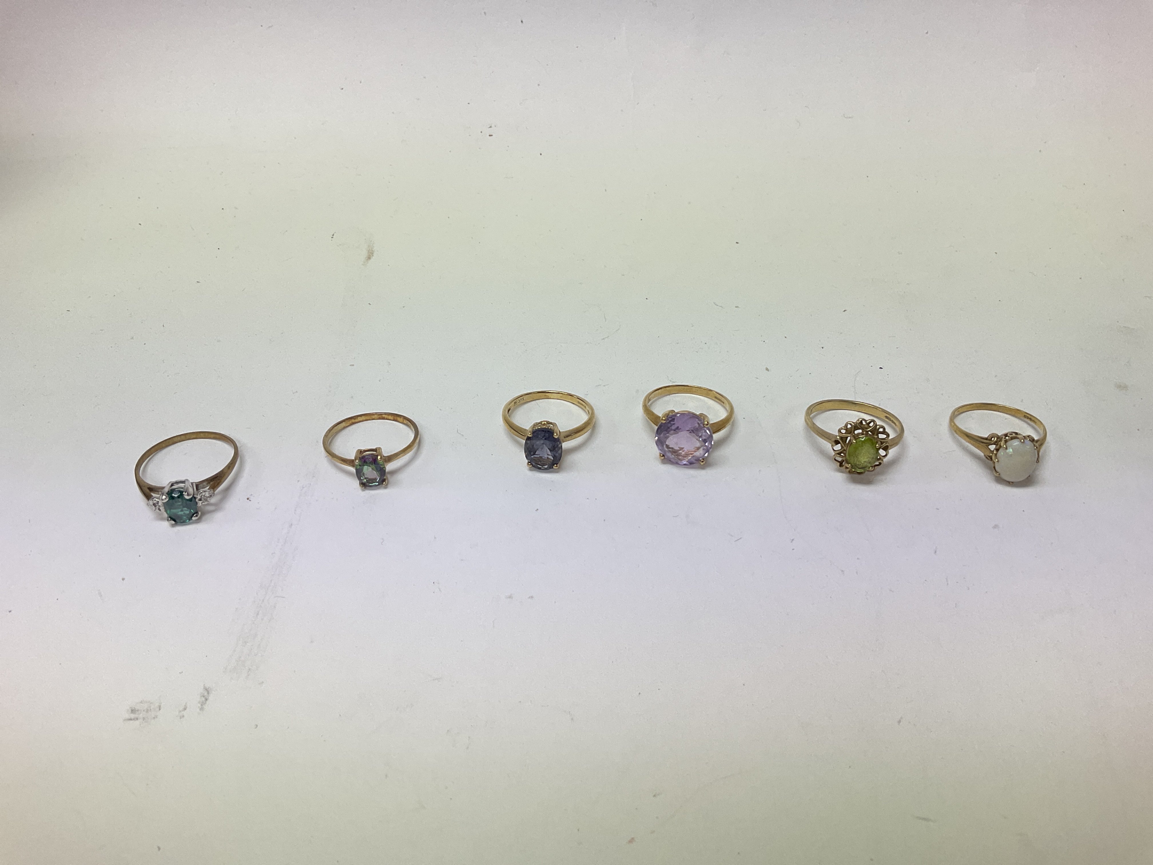 A small collection of 9ct gold stone set rings, approx weight 13.94 grams.