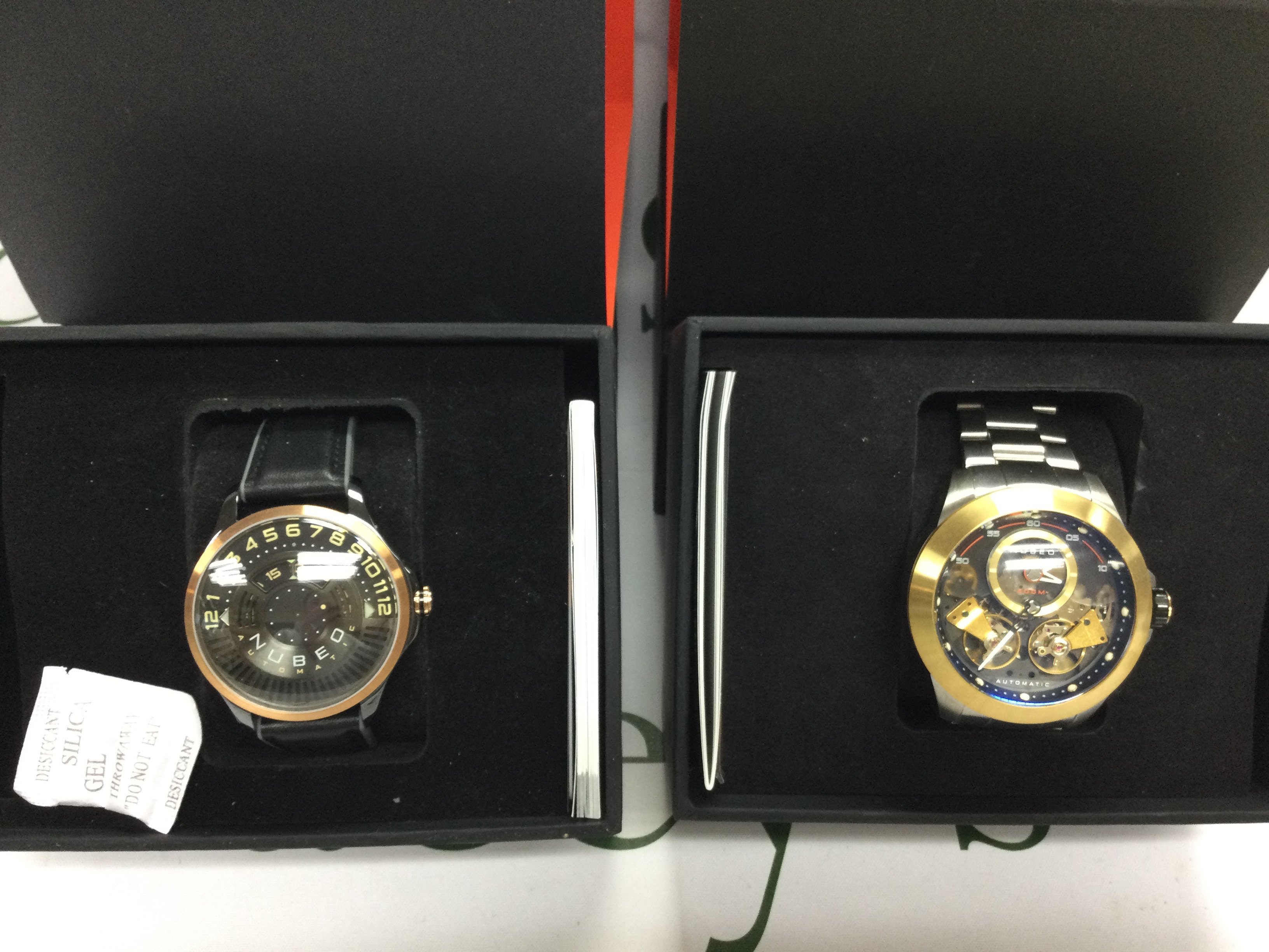 Two Nubeo automatic watches both seen running with box and paperwork. Postage B