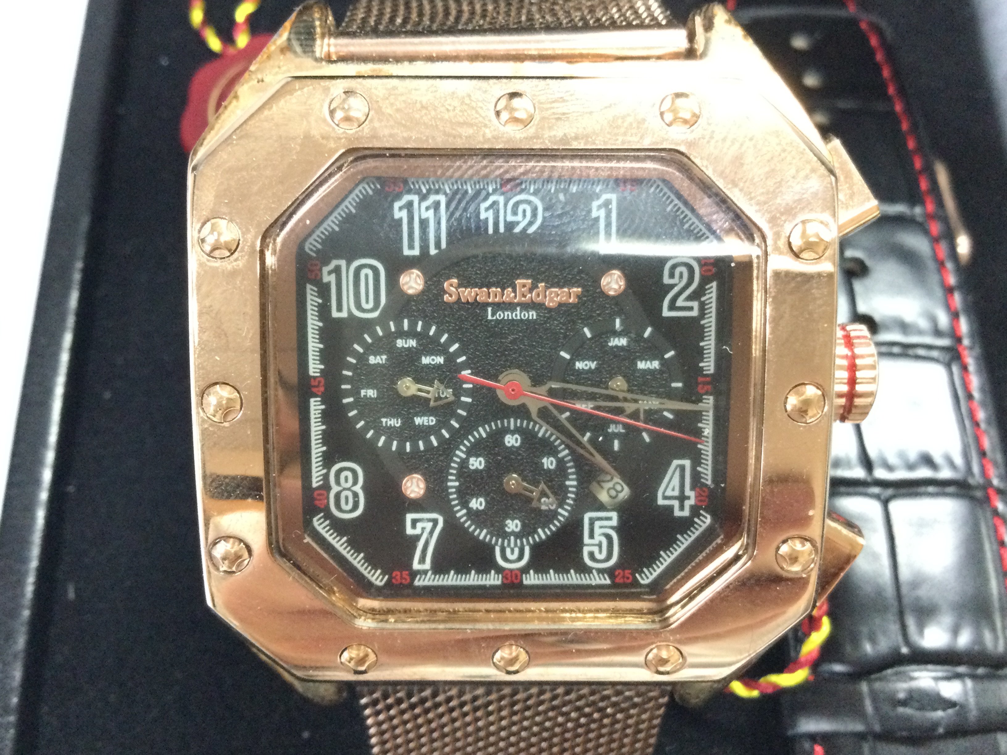 A gents Swan and Edgar automatic watch seen running with box and papers. Postage B