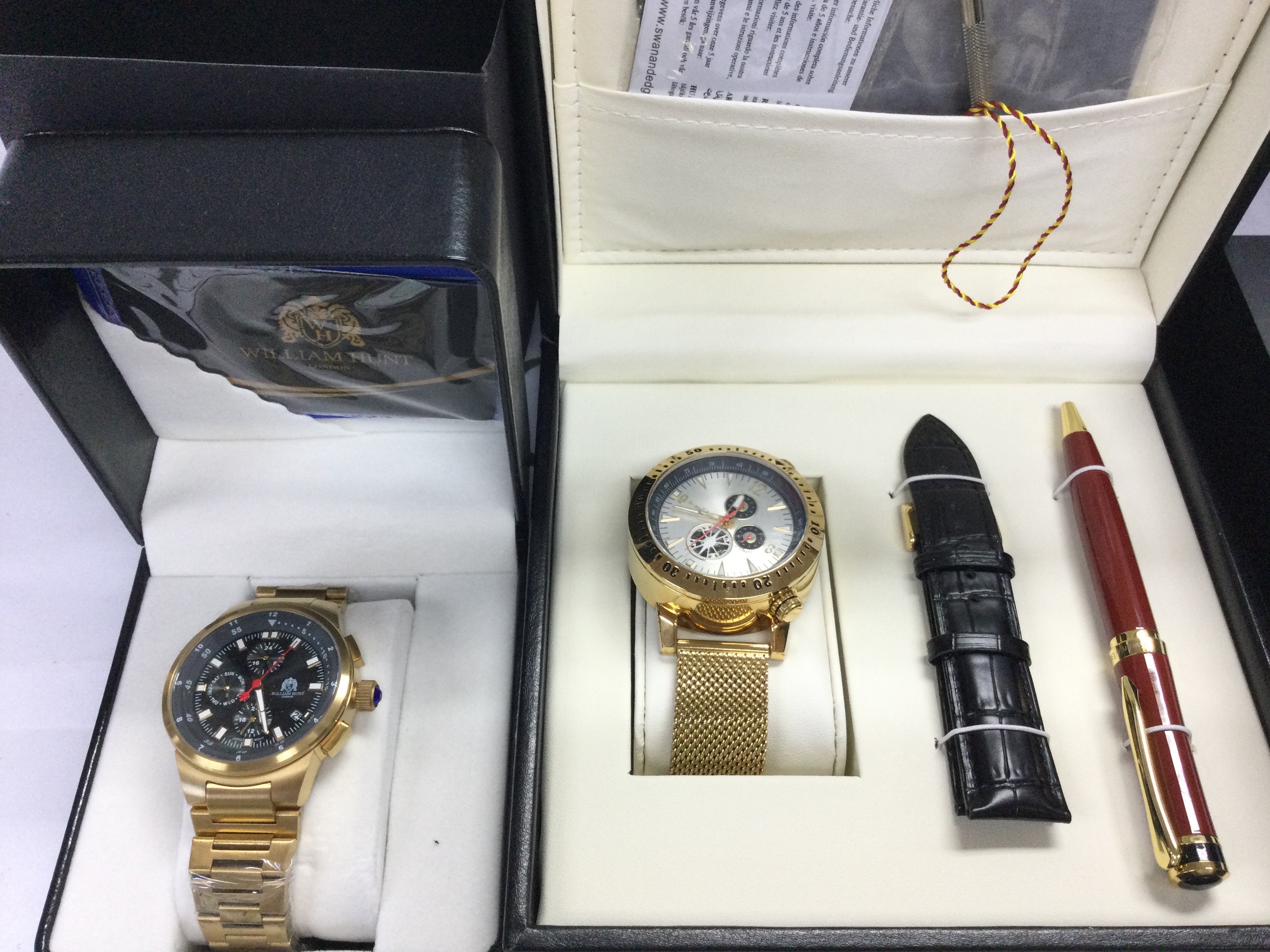 Two gold tone gents wrist watches both running and in boxes with paperwork. Postage B