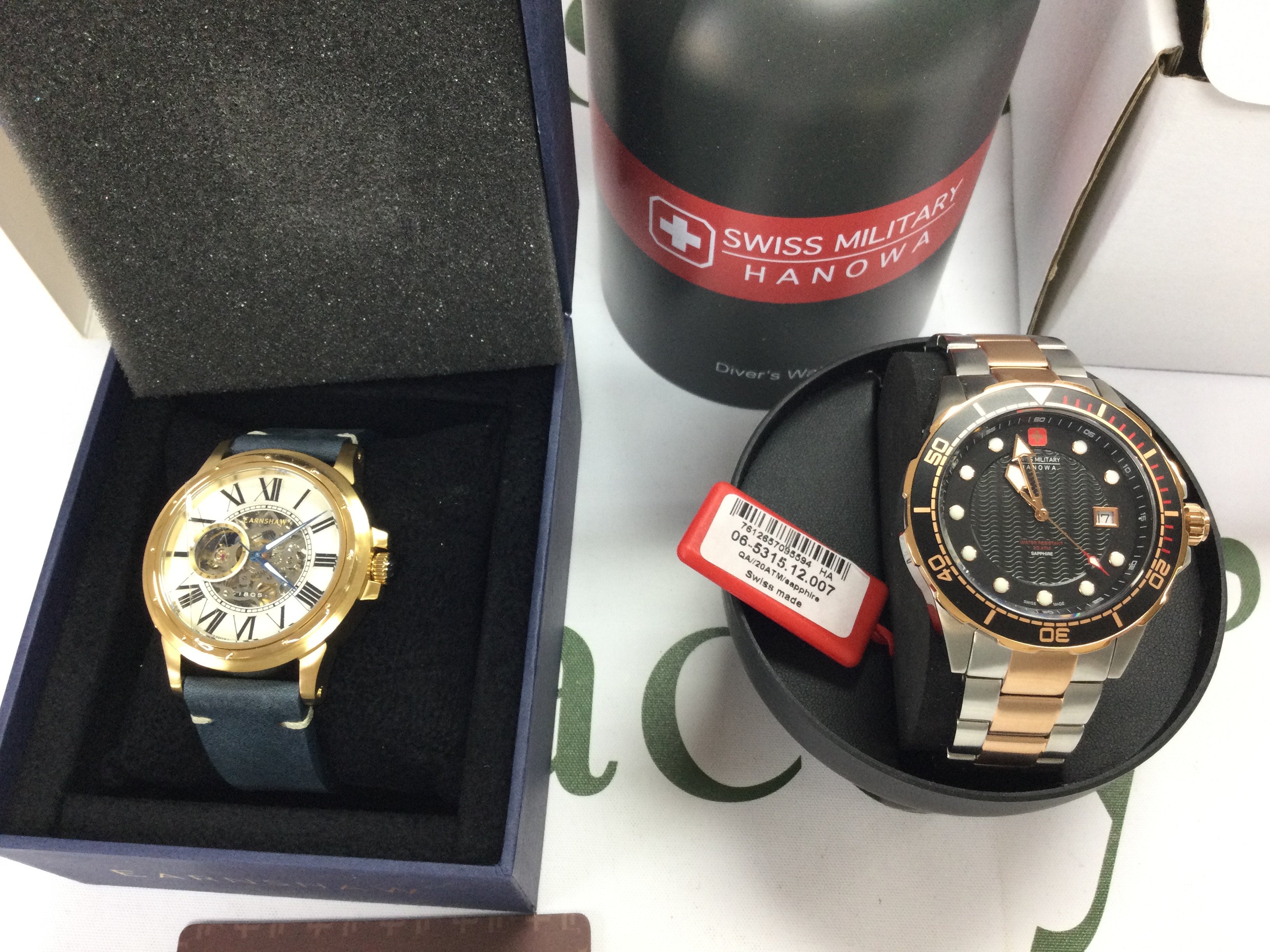 A Earnshaw gents wrist watch in as new condition and a Swiss Military Hanowa watch. Postage B