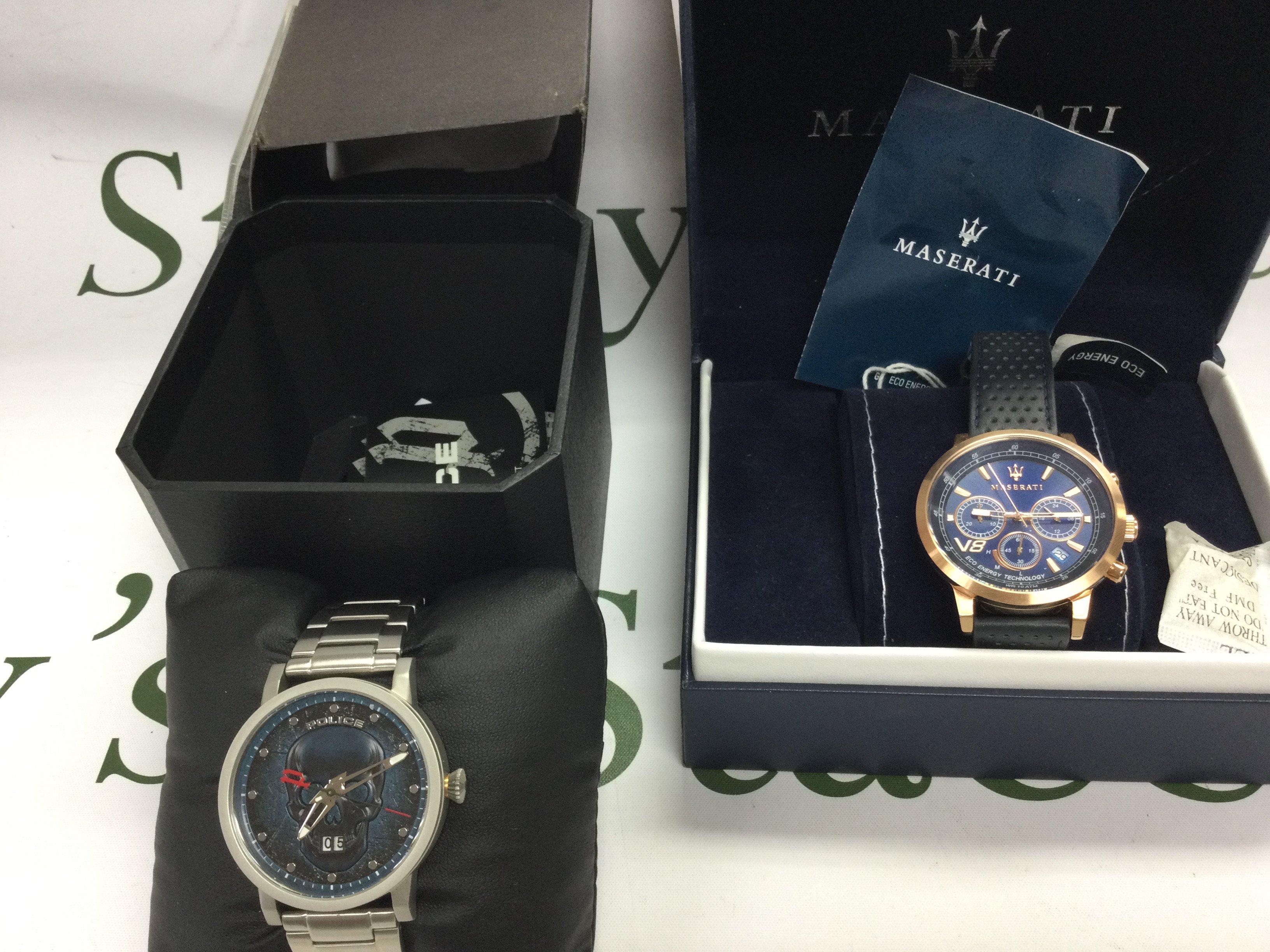 Two gents watches including a Maserati and a Police watch both with boxes and paperwork. Postage B