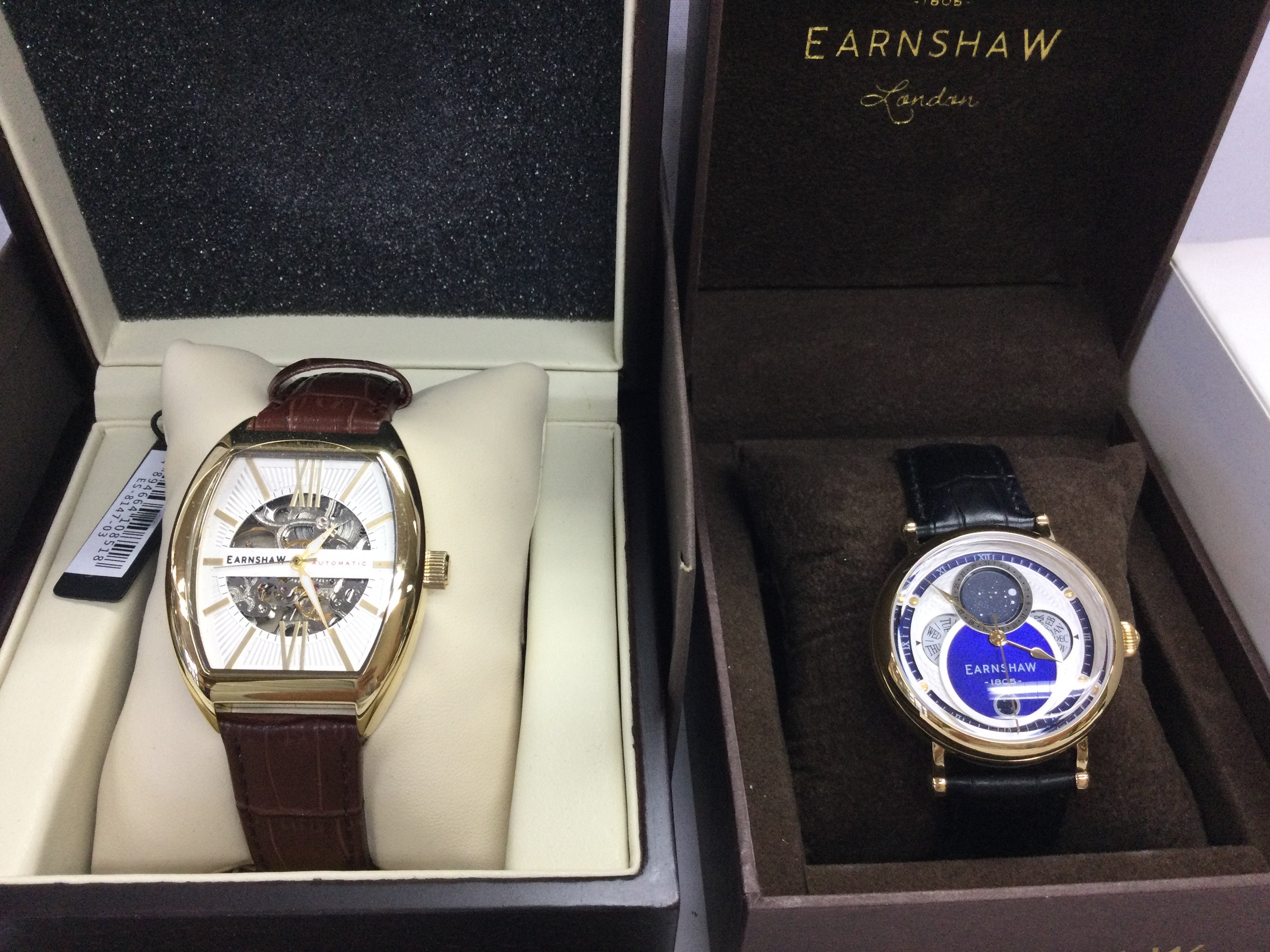 Two Earnshaw watches including a moon phase. Both in excellent condition and seen running. Postage B
