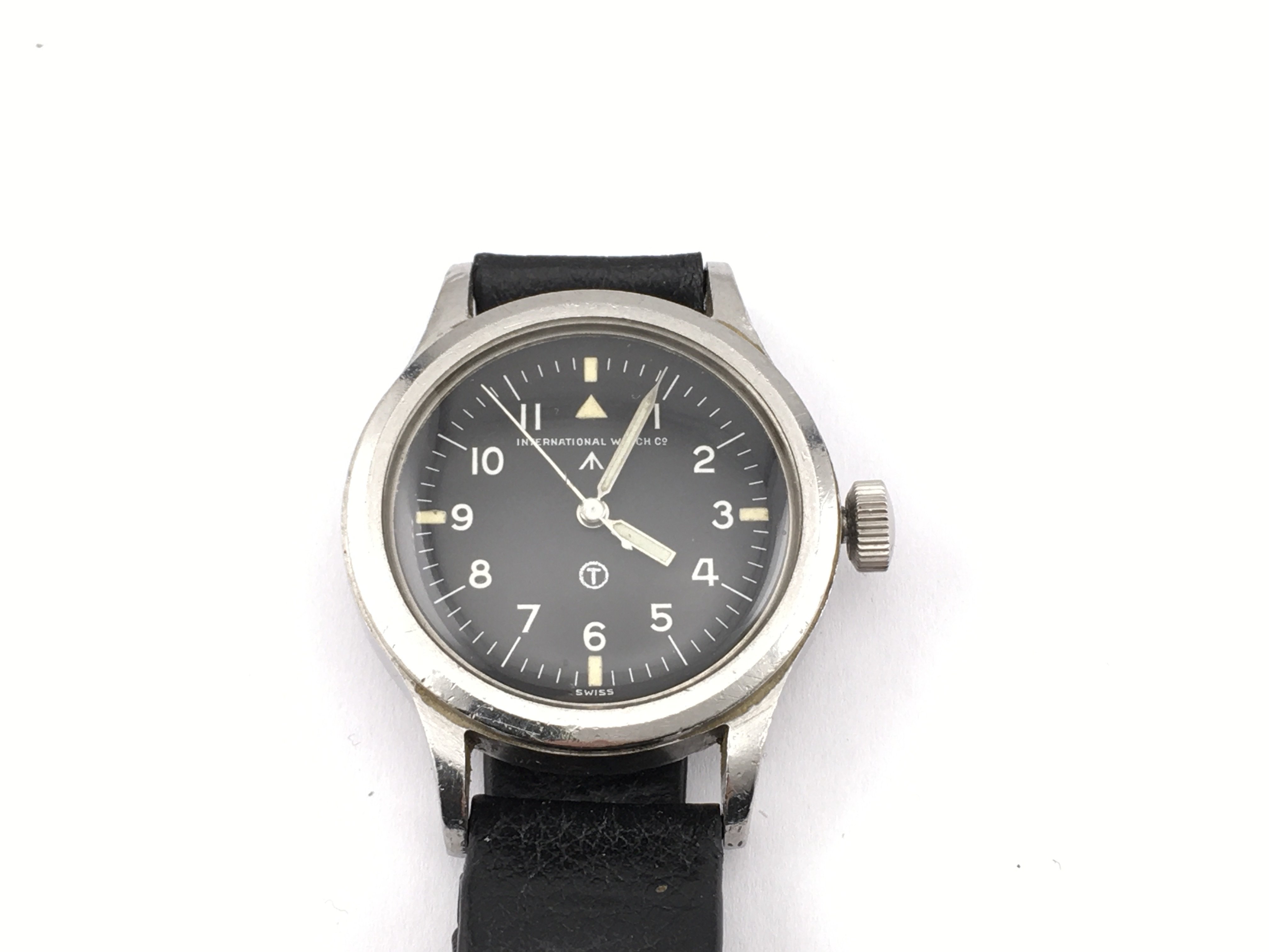 International watch company stainless steel manual wind military wristwatch issued by RAF. Approximately 36mm case. Crown needs attention. Runs intermittently. Postage B