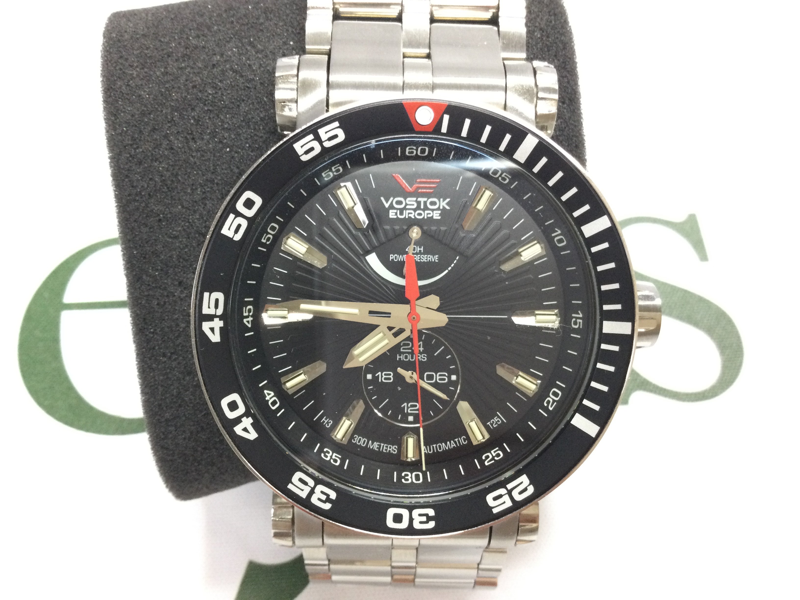 A Vostok Europe black rocket automatic wrist watch with spare strap. As new condition with box and papers. Postage B