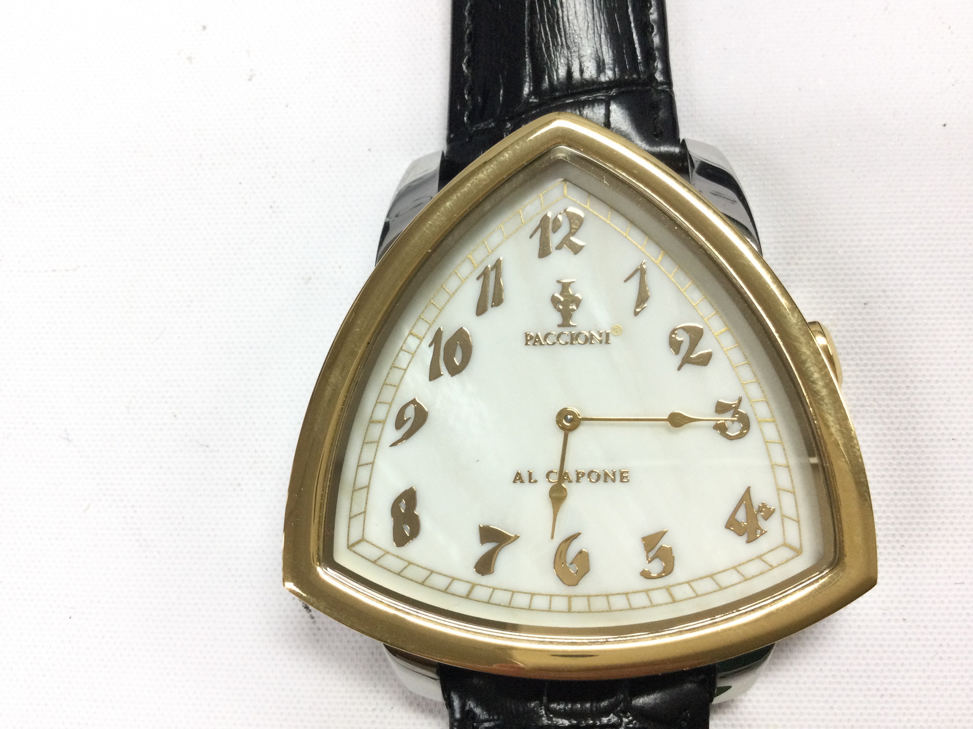 A Paccioni Al Capone 51mm two tone watch with interchangeable straps. Comes with box and papers. Postage B