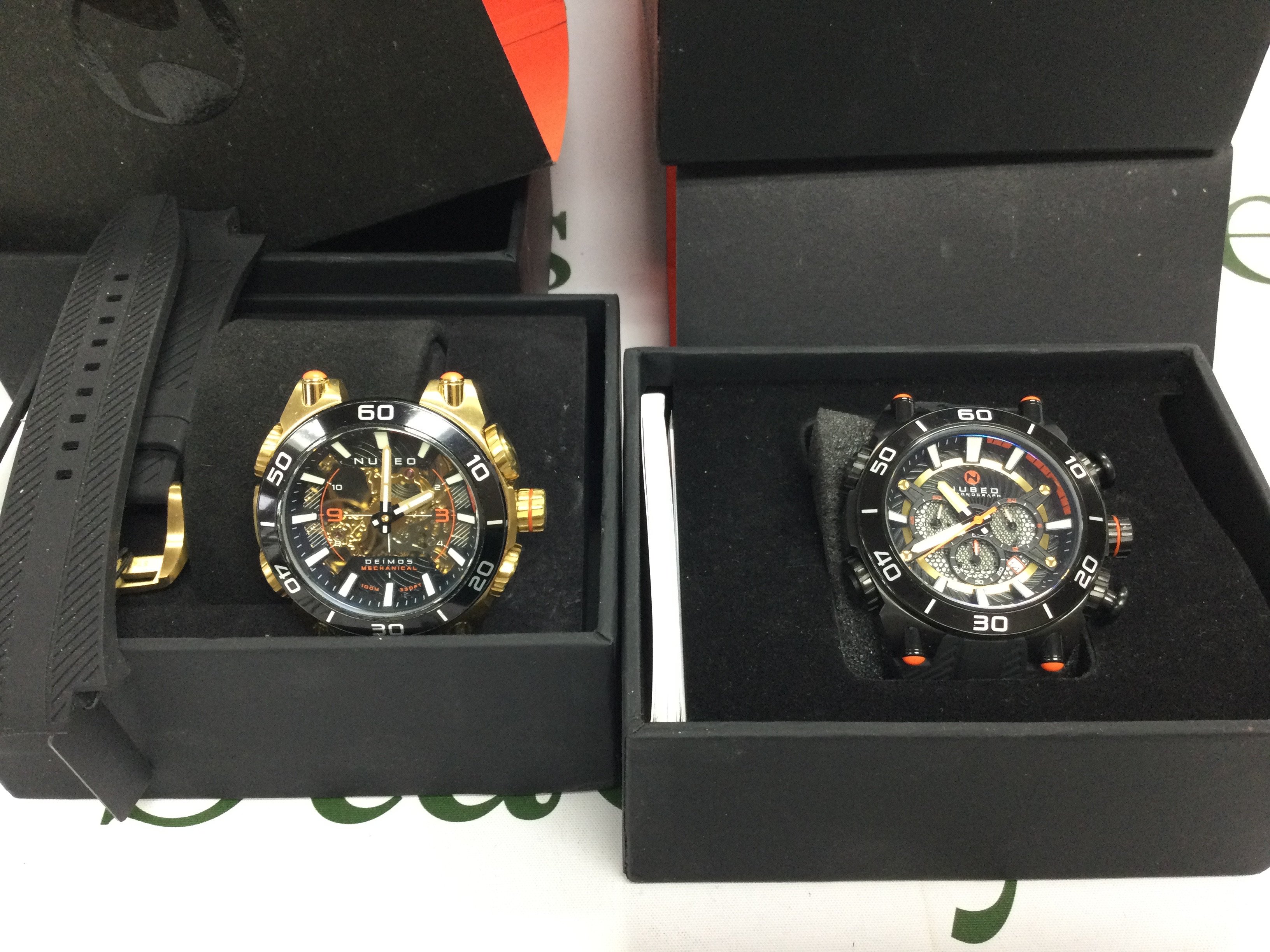 Two Nubeo gents watches with boxes. One automatic and one quartz. Postage B
