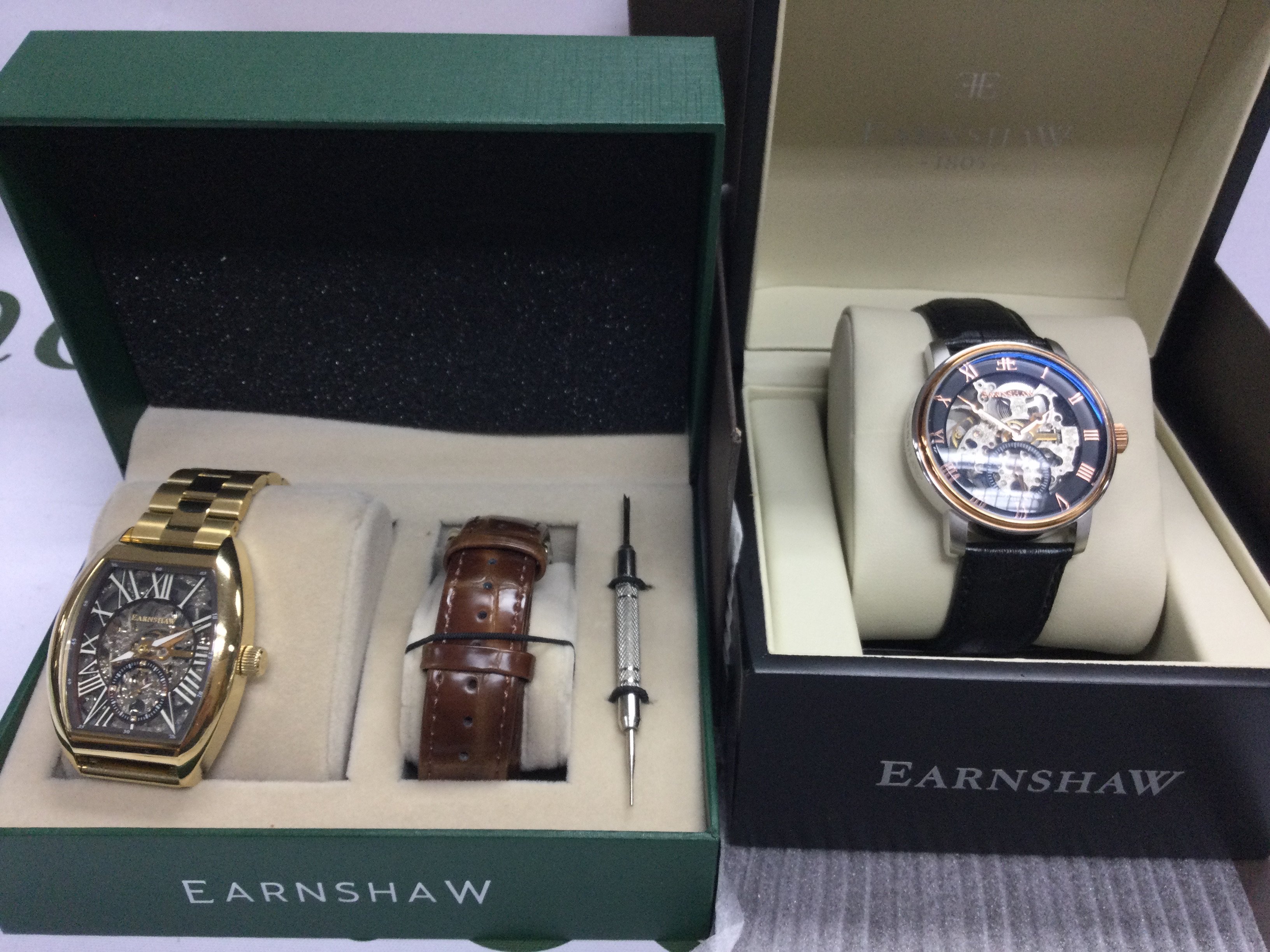 Two Earnshaw automatic wrist watches including boxes both seen running. Postage B