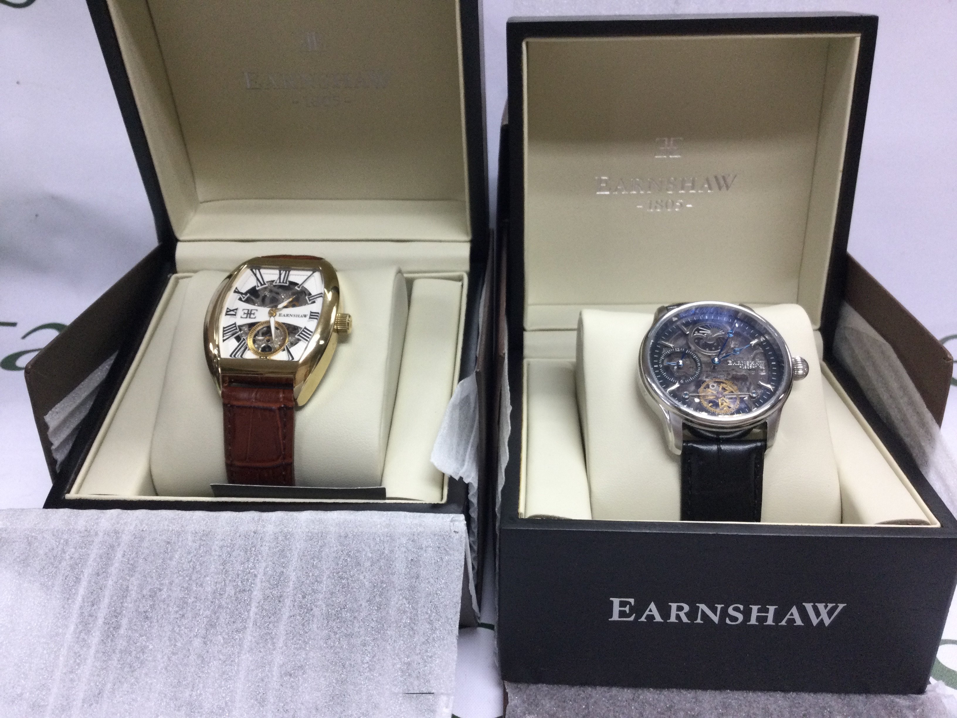 Two Earnshaw wrist watches including boxes both seen running. Postage B
