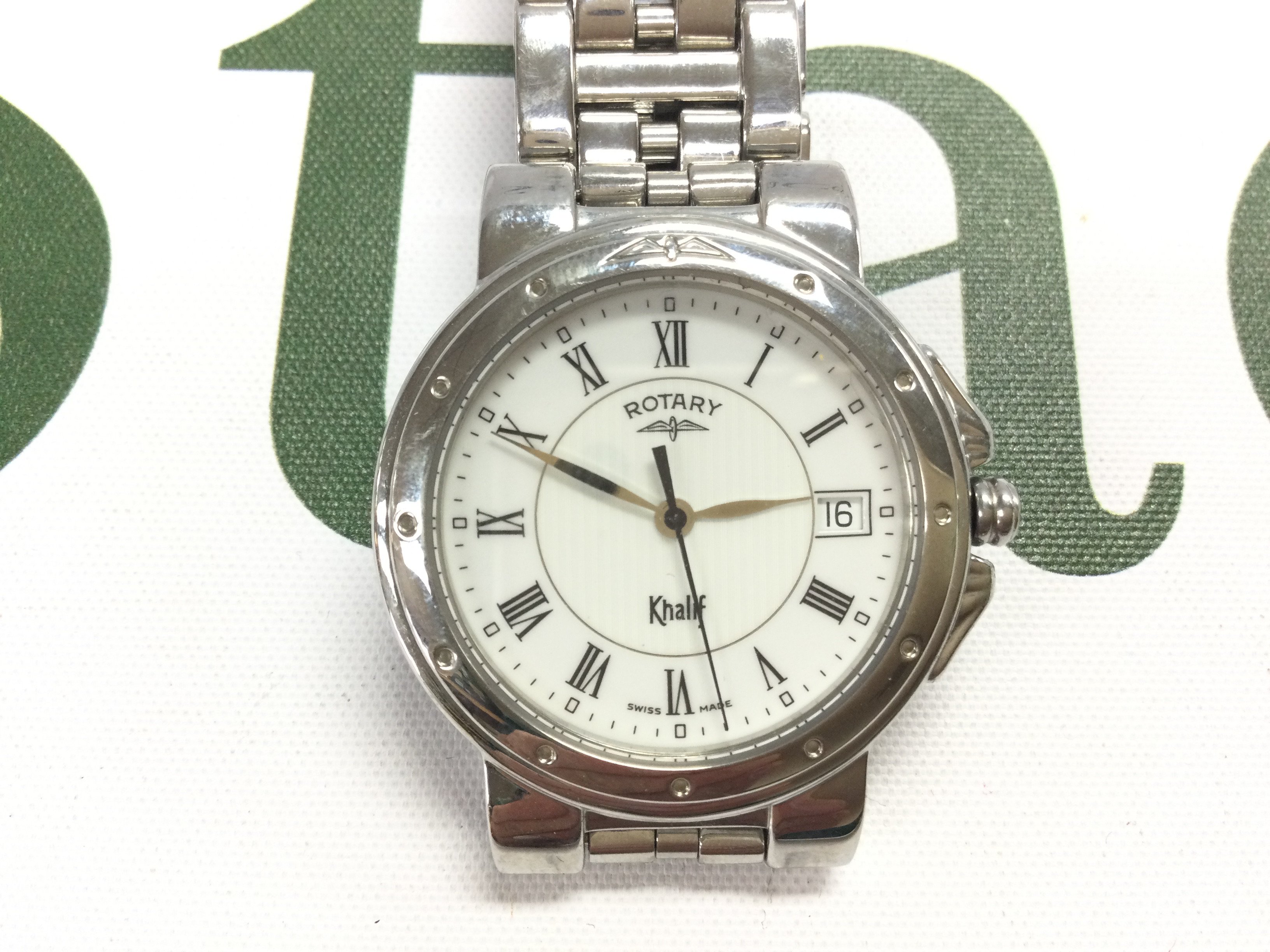 A Rotary Khalif watch with date aperture Approx 35mm case. Seen working. Postage B