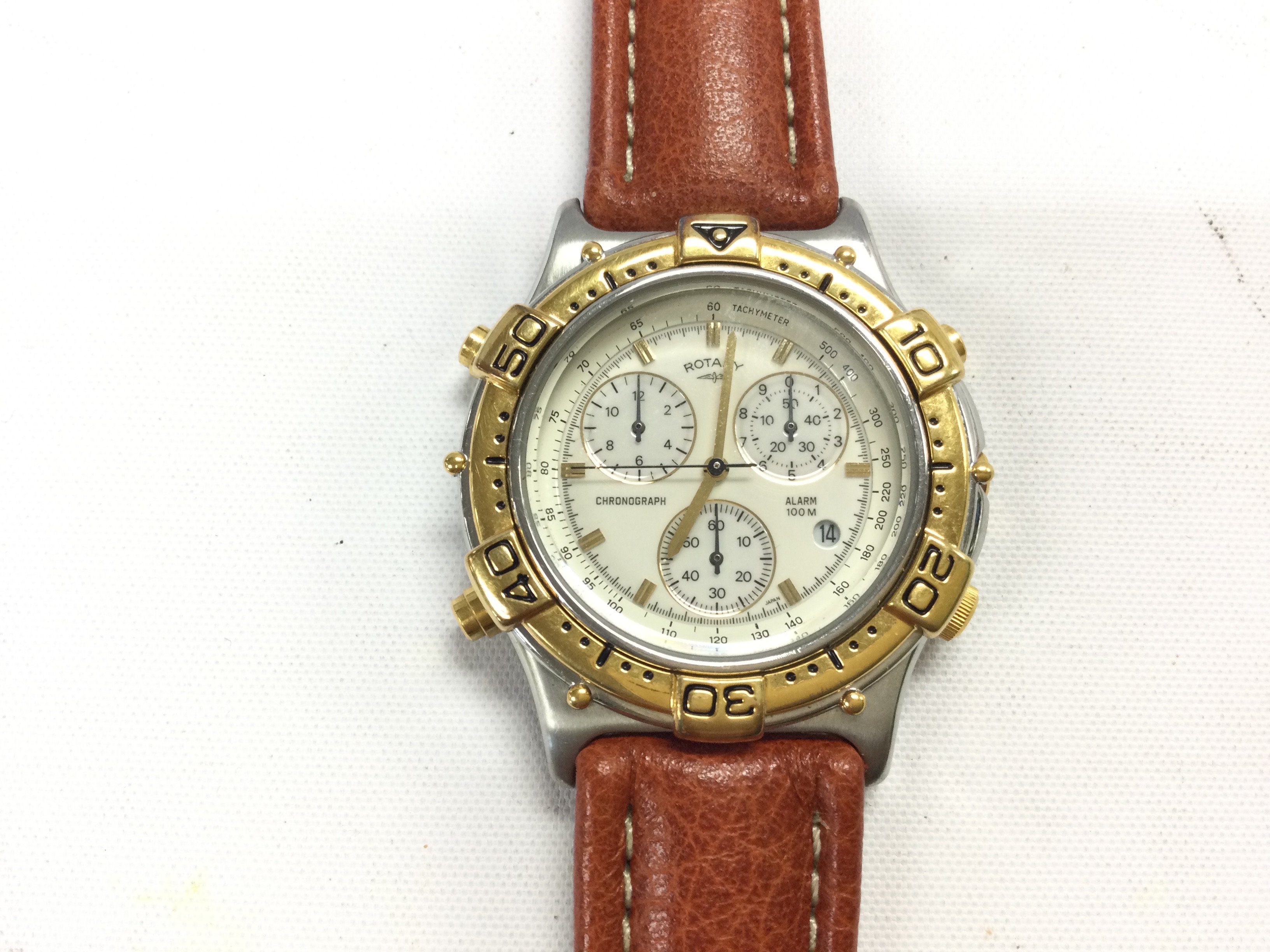 A Rotary quartz Chronograph watch on brown leather strap. Postage B