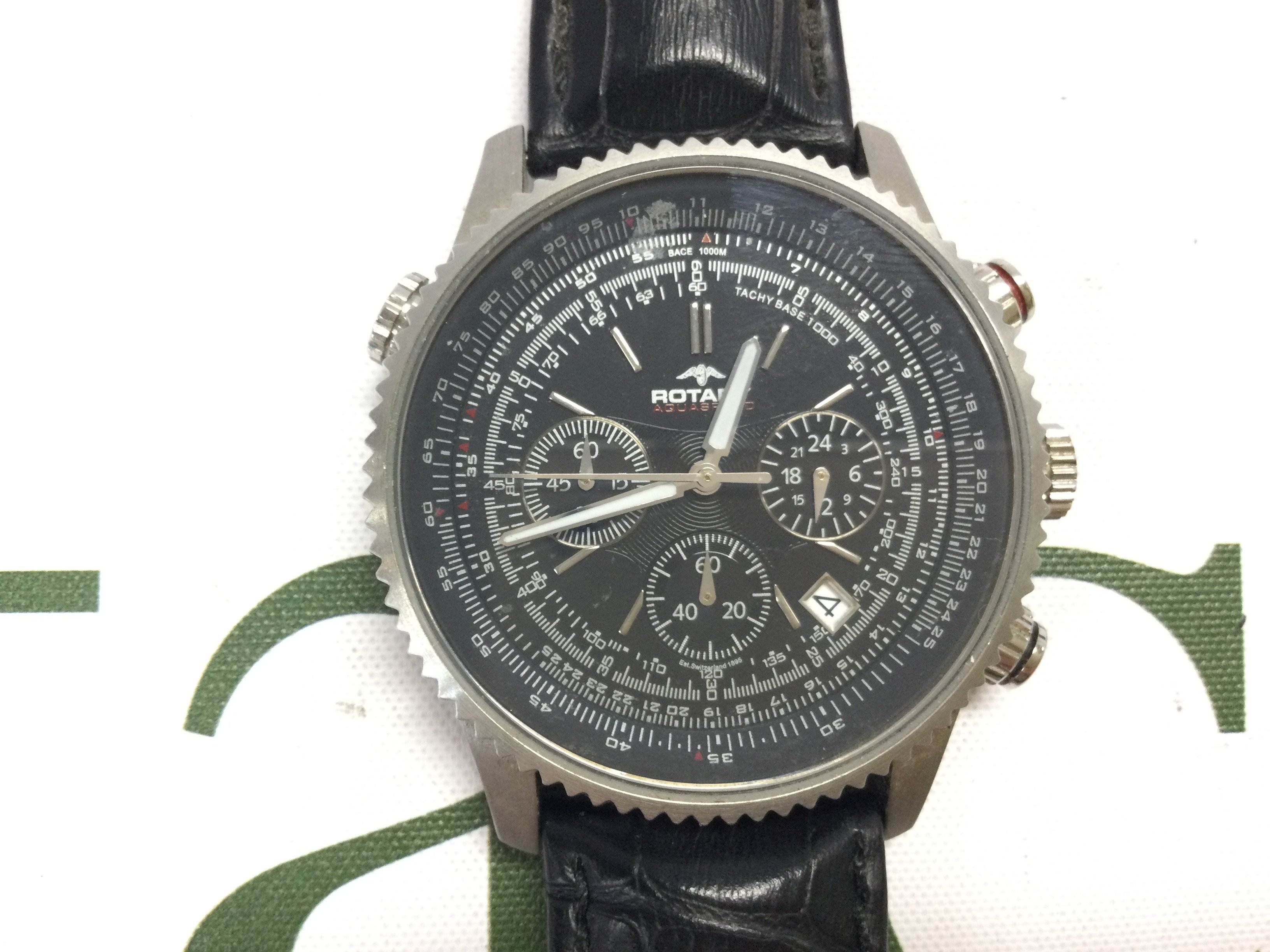 A Rotary aquaspeed Chronograph watch on black leather strap. Postage B