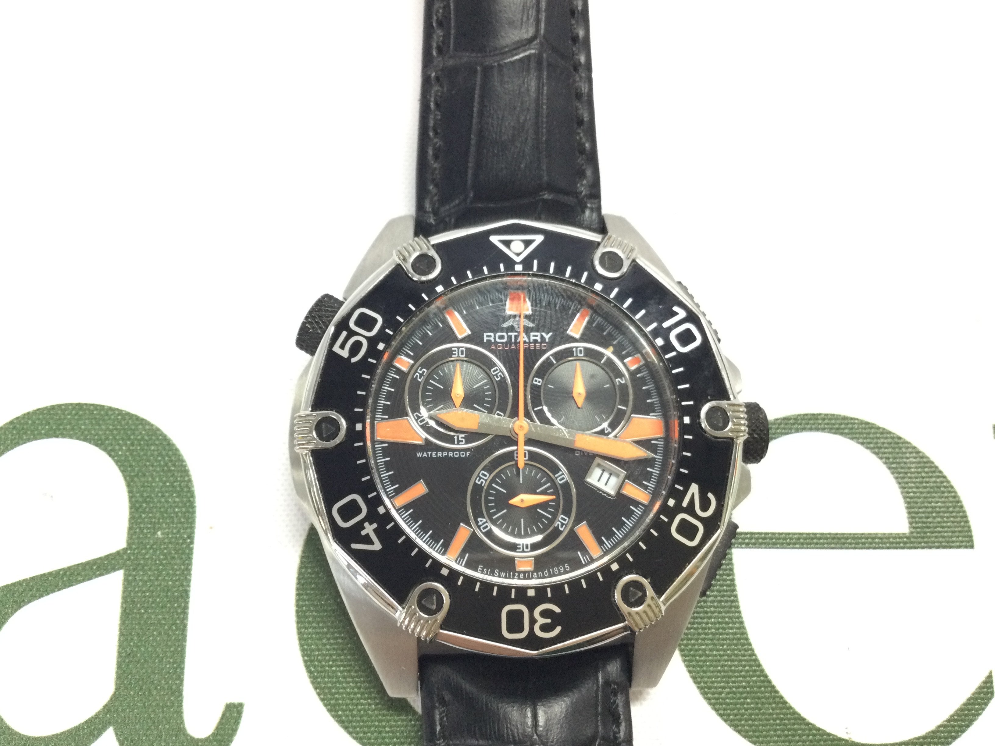A Rotary aquaspeed Chronograph watch on black leather strap. Postage B