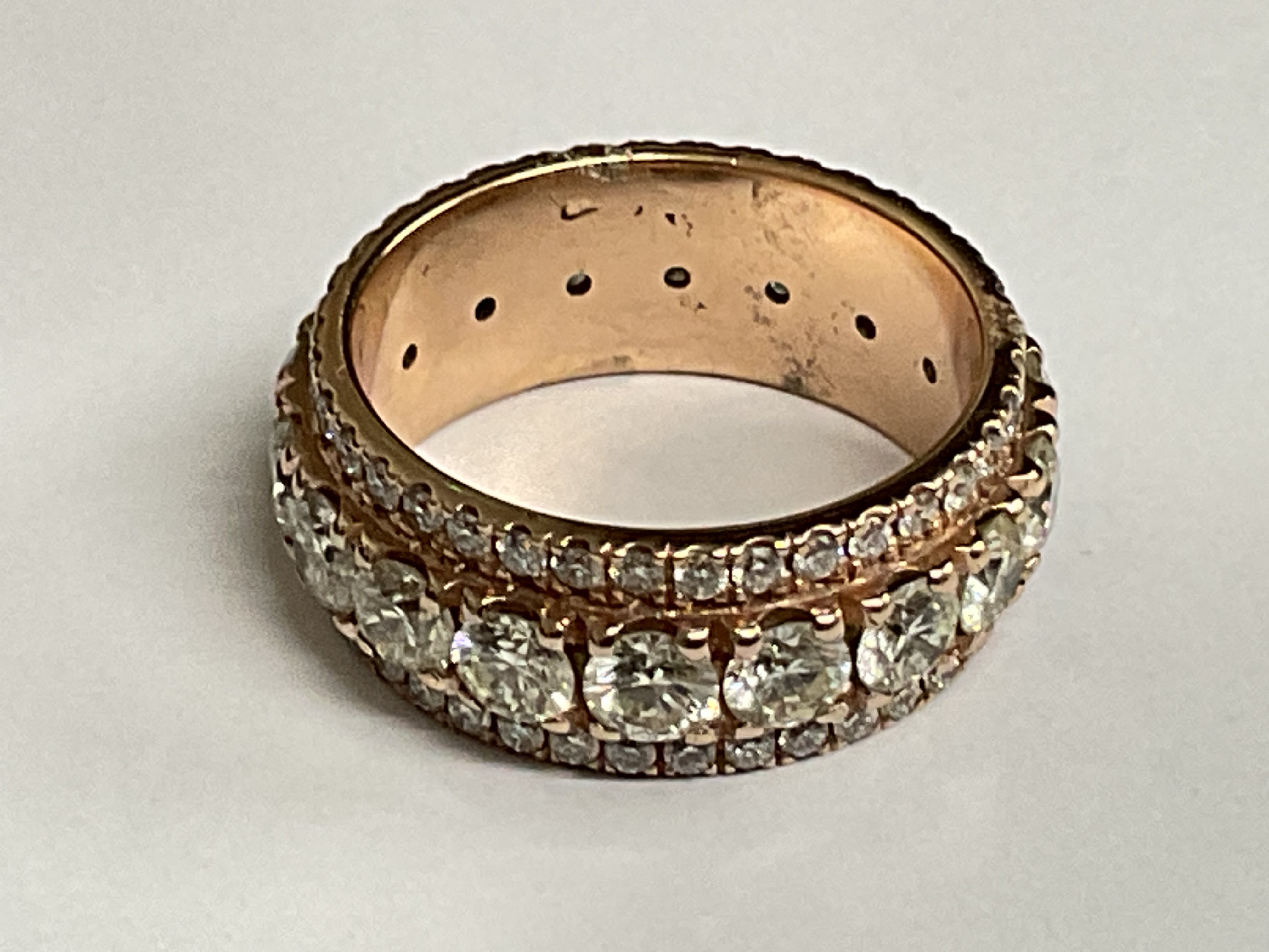 18ct rose gold 3.30ct, 8.43 grams, ring size approx O. Full eternity. Postage category A.