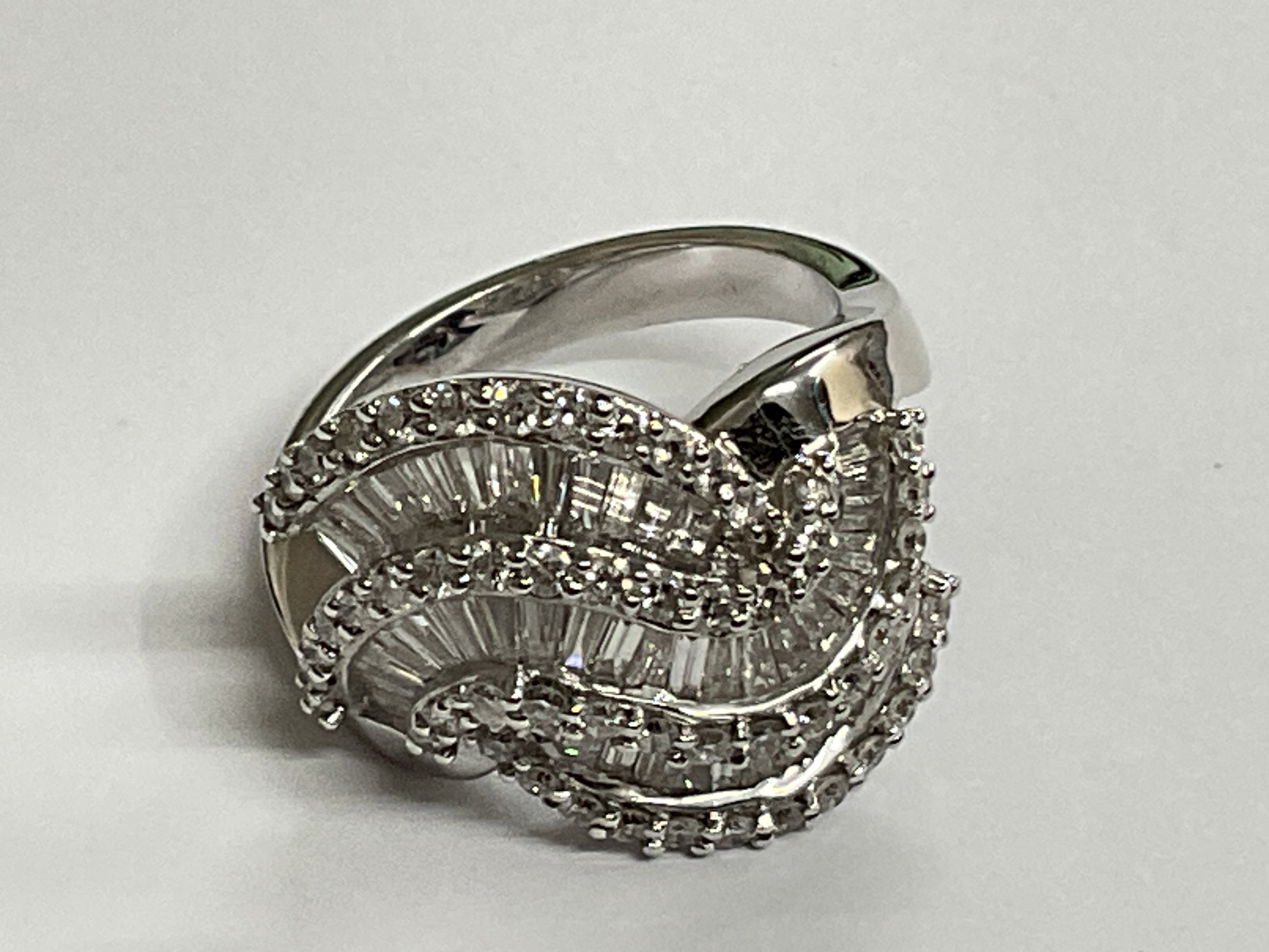 18ct white gold ring baguette round diamond 2.10ct, 11g, ring size approx M. Postage category A.
