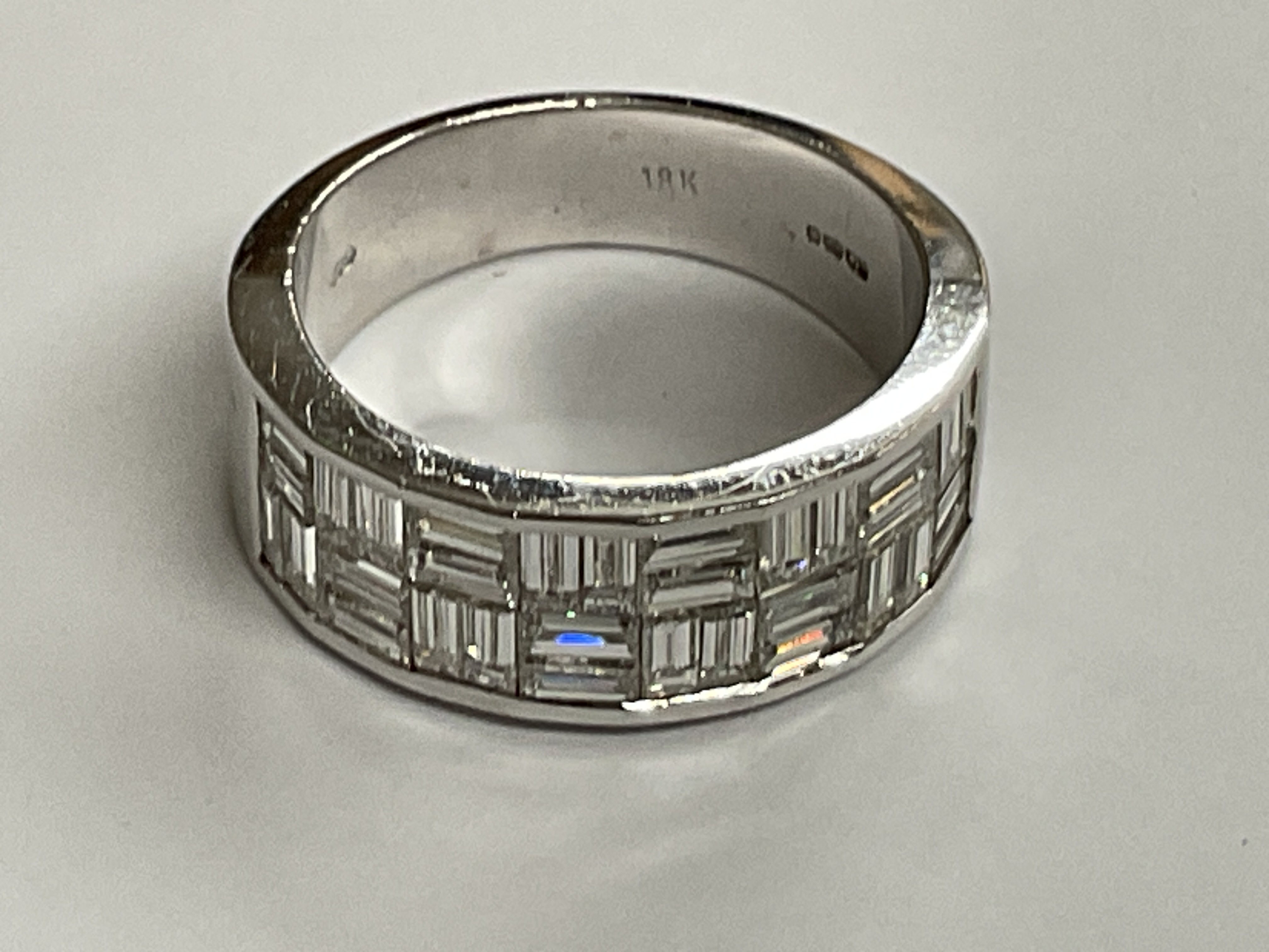 18ct diamond ring baguette. Approx ring size O. 6.8g, 2.7ct. Postage category A.