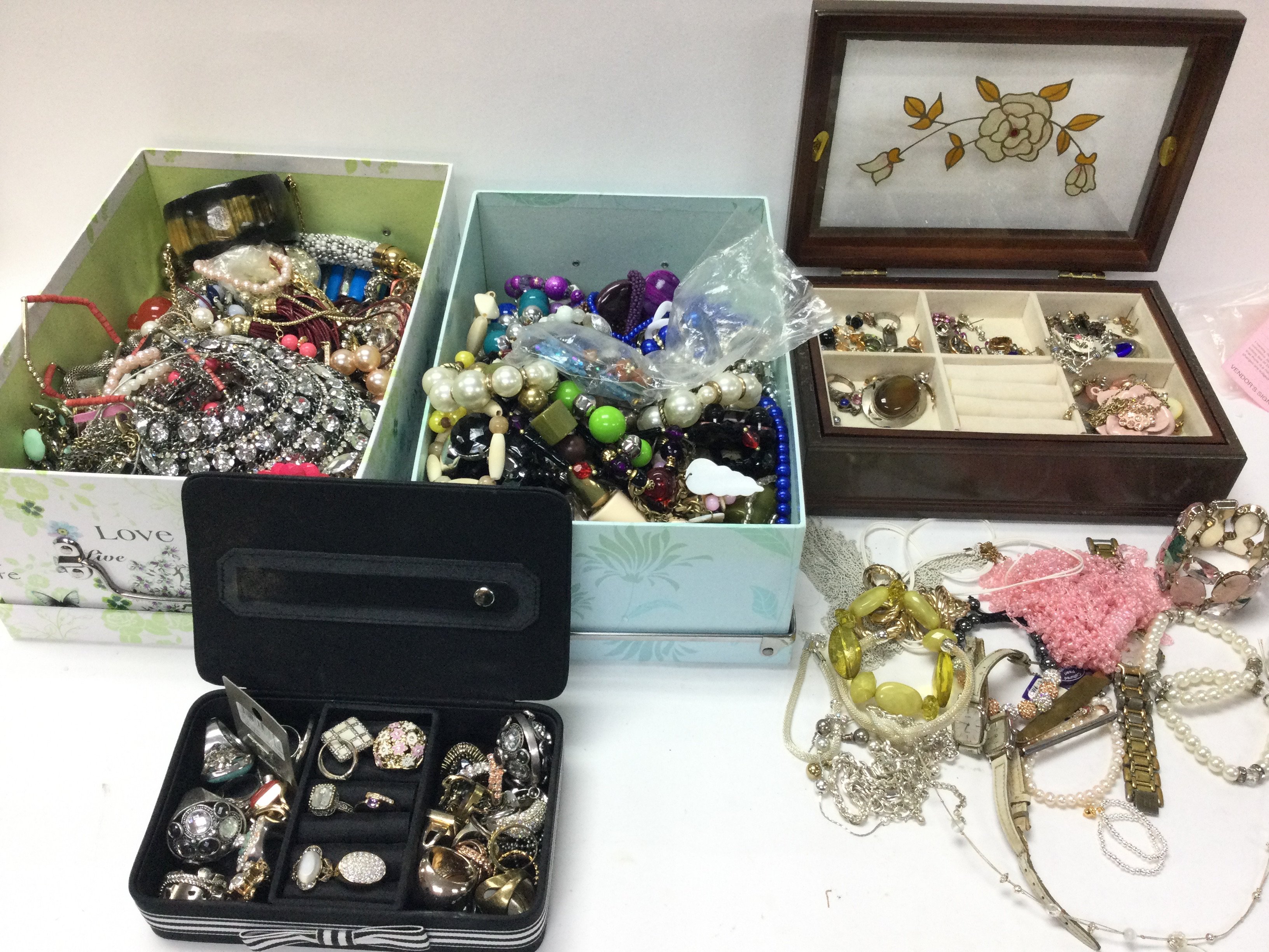 A large collection of assorted costume jewellery including rings necklaces bangles etc. Postage C