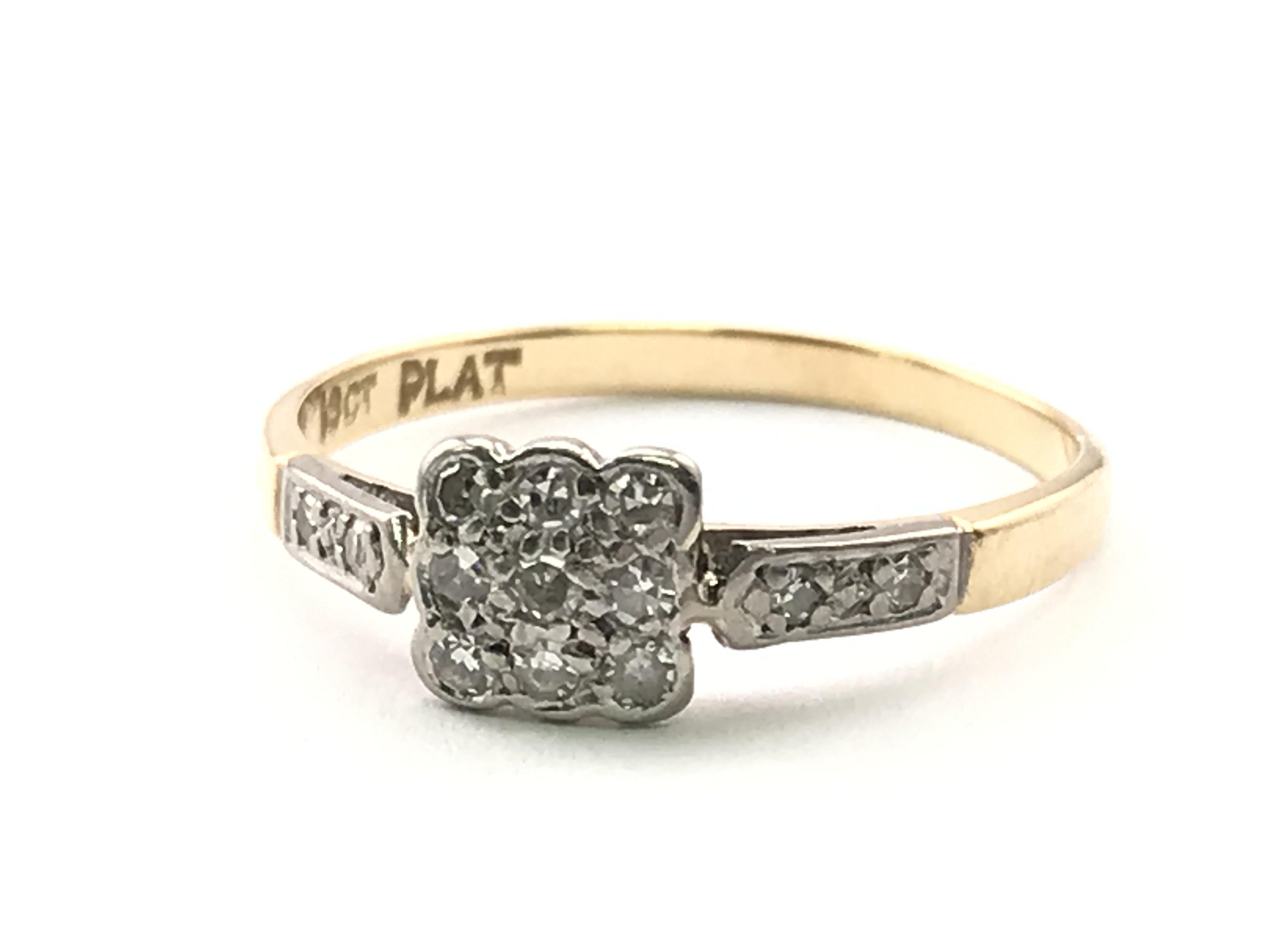 An 18ct gold and platinum art deco diamond ring , 1.65g total weight, ring size O. Postage category A