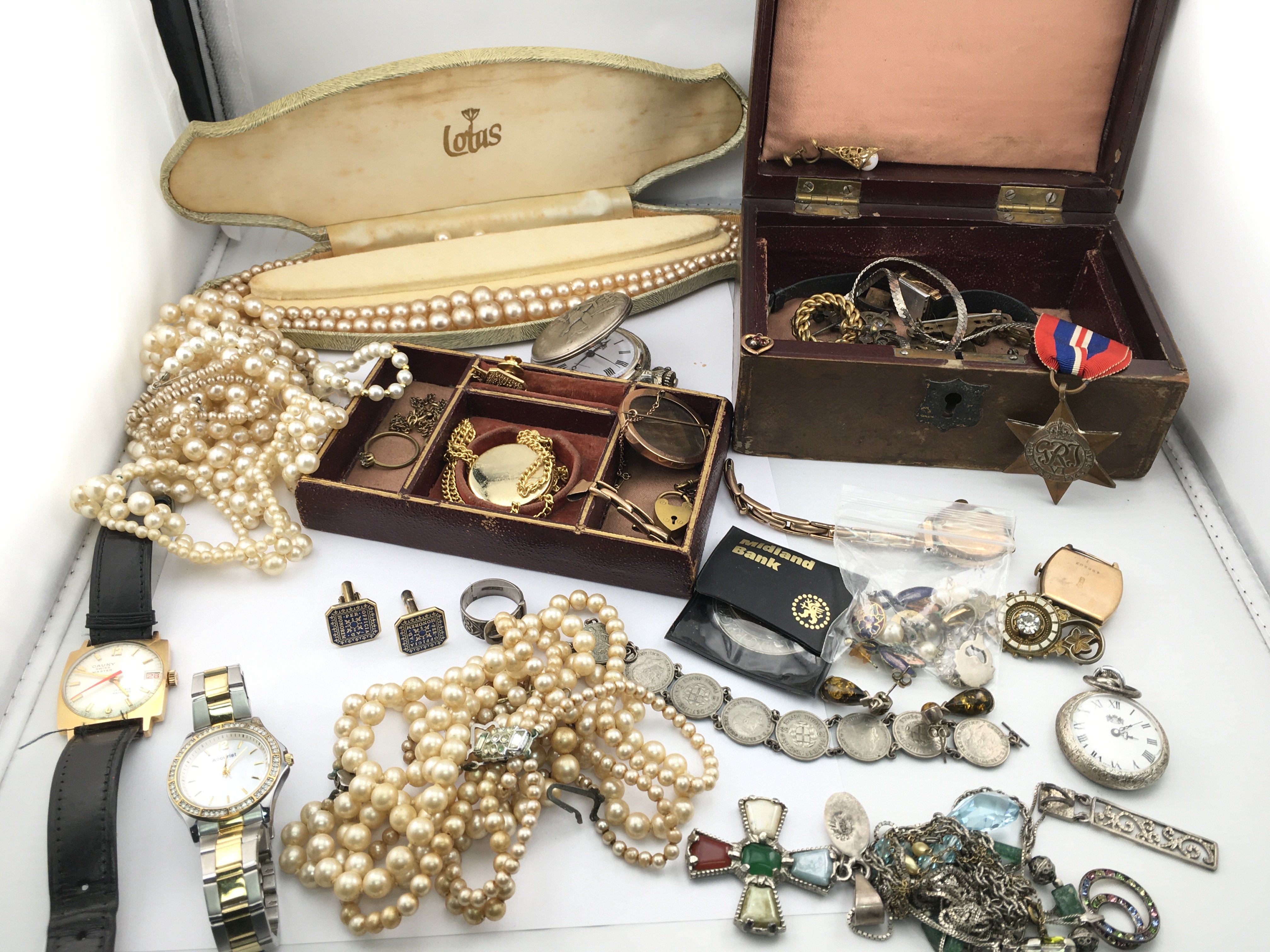 A Collection of costume jewellery including 9ct gold items and silver items. Postage B