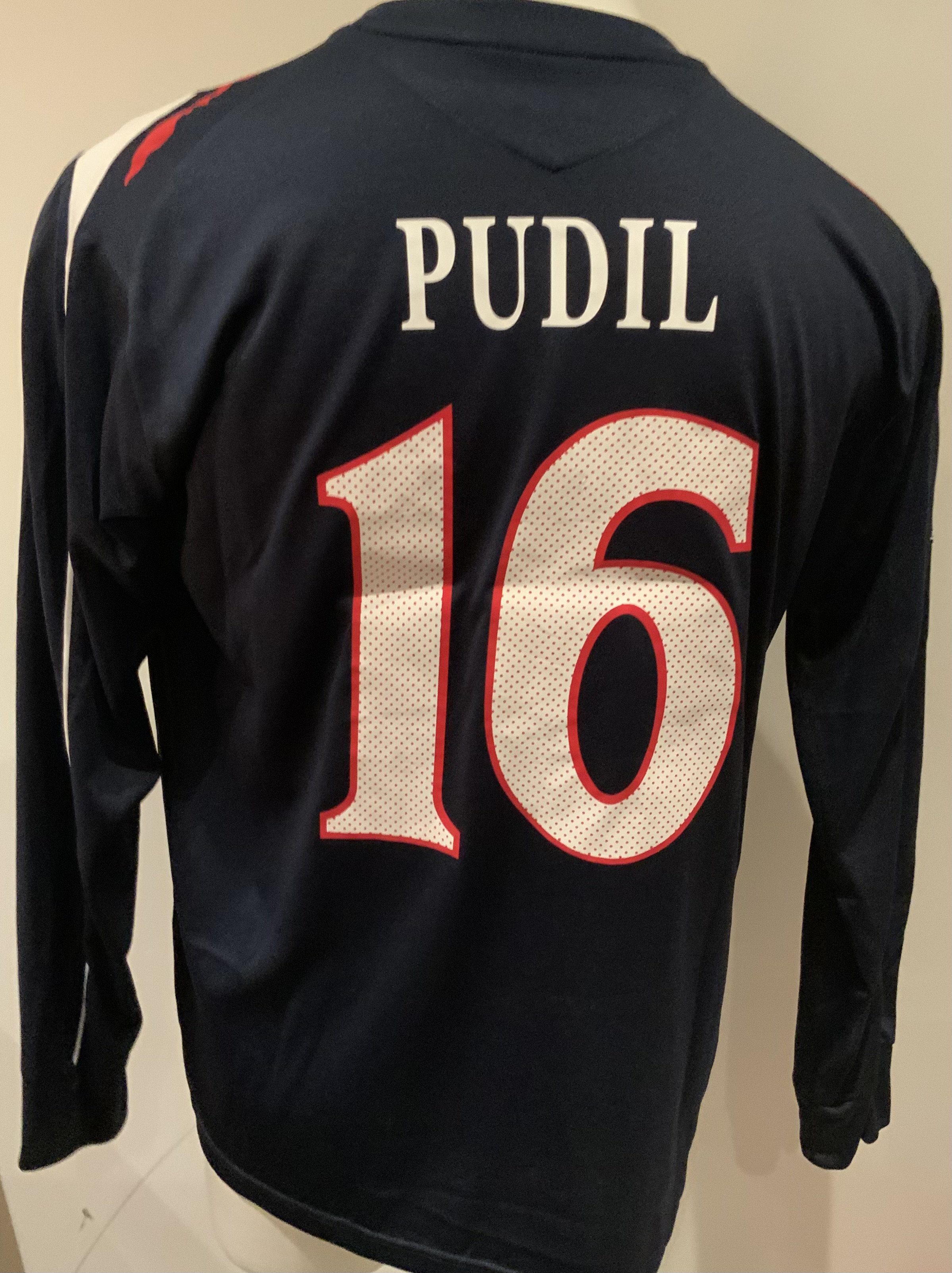 Slavia Prague 2007 - 2008 Match Worn Football Shirt: Black long sleeve shirt with Europa League badging to sleeves. Pudil 16 to rear. Worn during the 1-1 draw against Tottenham on 21 February 2008. Player played the whole match and was also booked. 