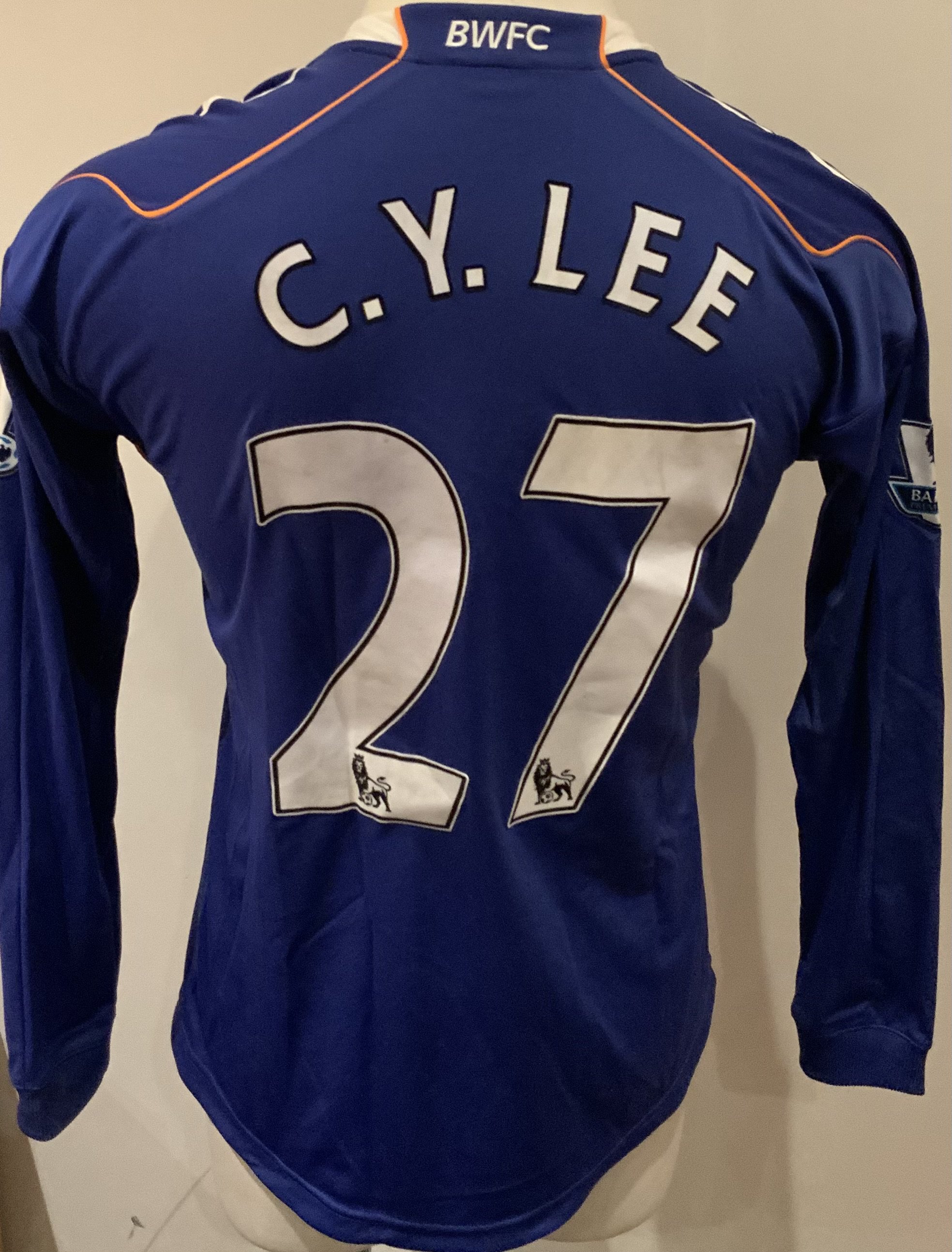 Bolton Wanderers 2010 - 2011 Match Worn Football Shirt: Blue long sleeve shirt with Premier League badges to sleeves. C Y Lee 27 to rear.