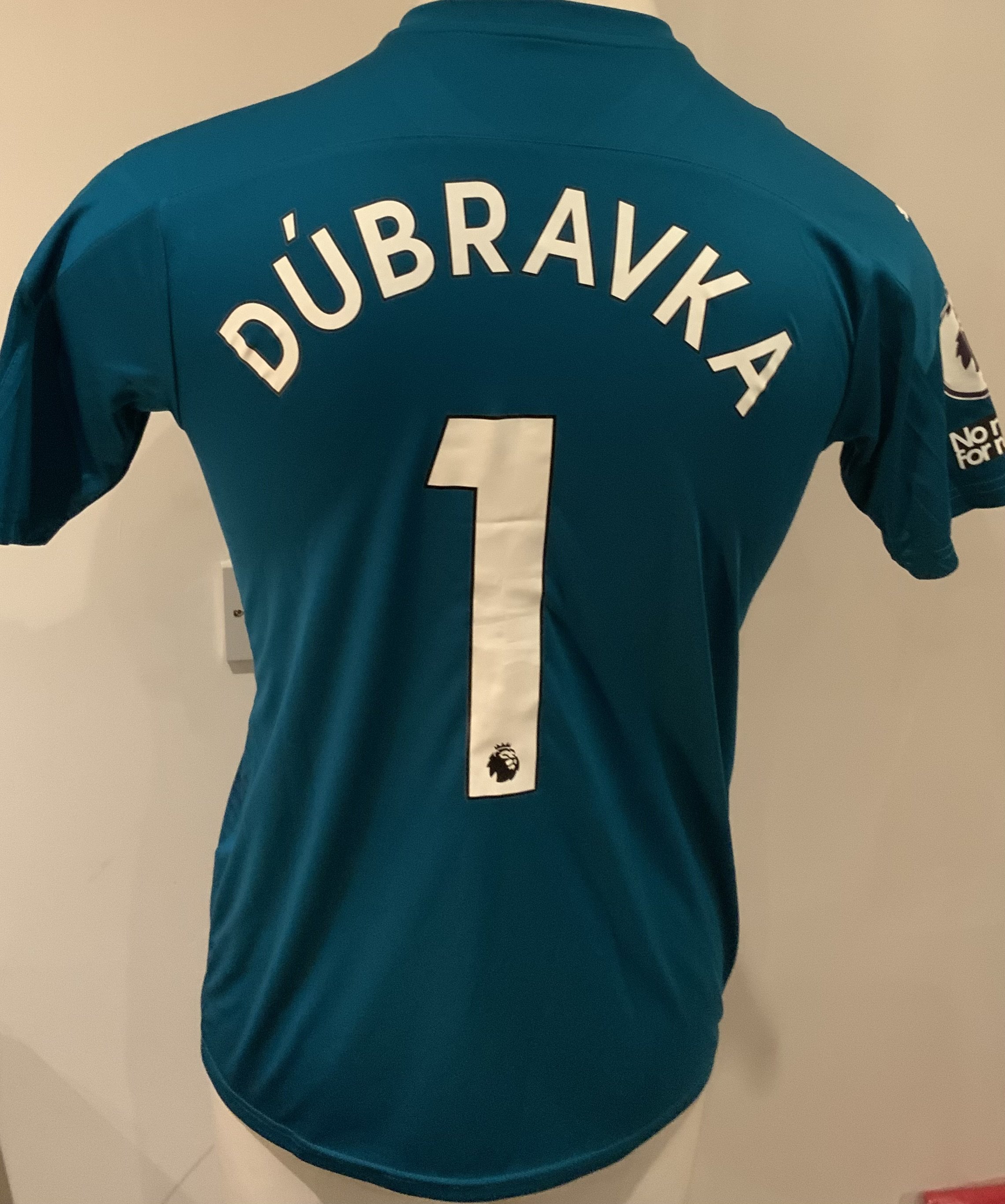 Newcastle 2020 - 2021 Match Worn Football Shirt: Green short sleeve Goalkeeper shirt with Premier League badge to sleeves. Dubravka 1 to rear.