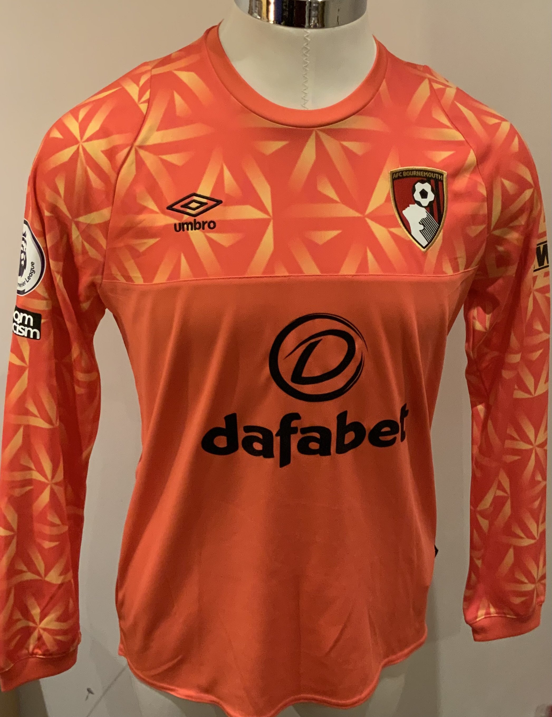 Bournemouth 2022 - 2023 Match Worn Football Shirt: Orange long sleeve goalkeeper shirt with Premier League badges to sleeves. Neto 13 to rear.