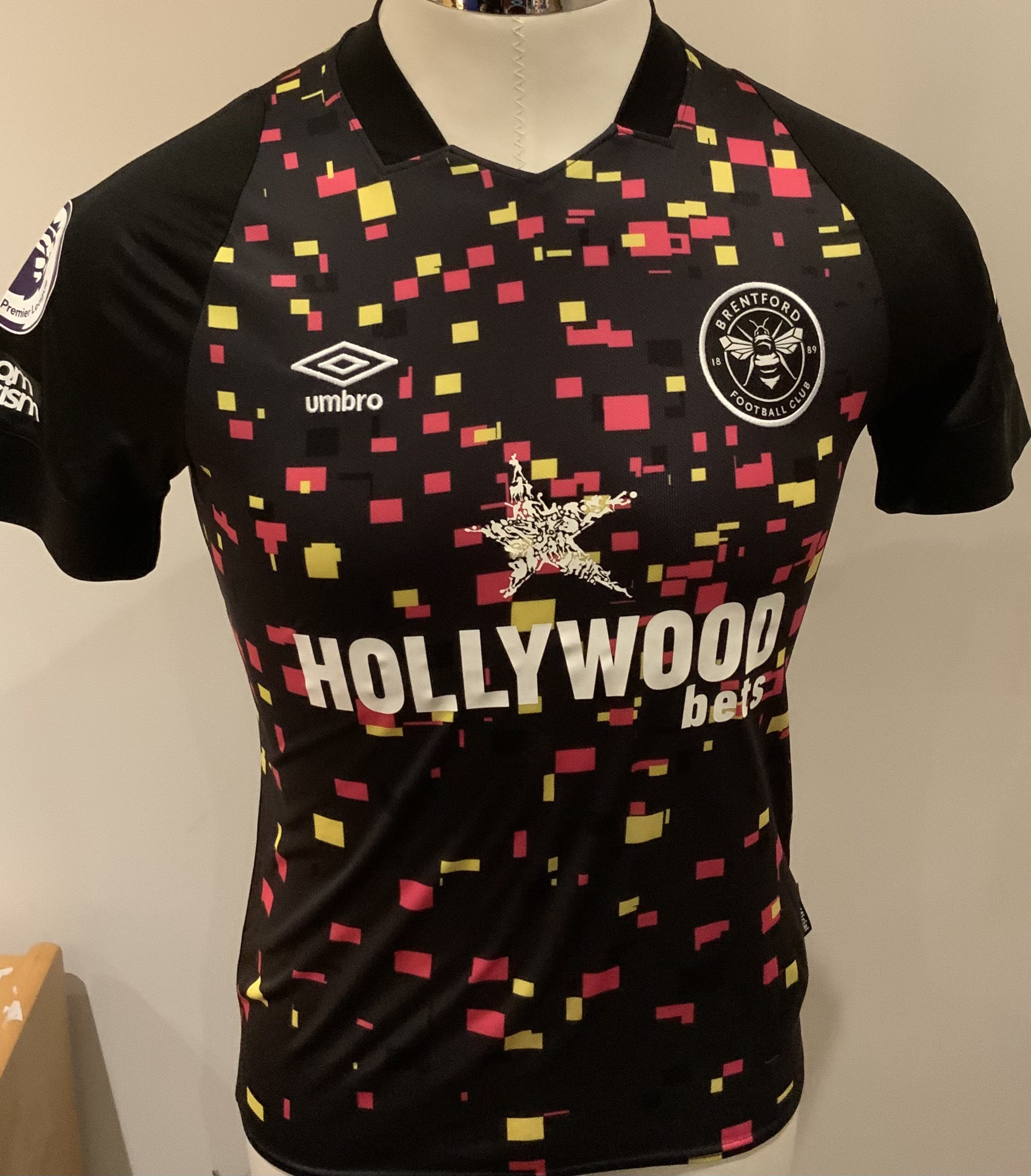 Brentford 2022 - 2023 Match Worn Football Shirt: Black and coloured squares short sleeve shirt with Premier League badges to sleeves. Henry 3 to rear. Worn in the 3-1 win v Tottenham on 20 May 2023.