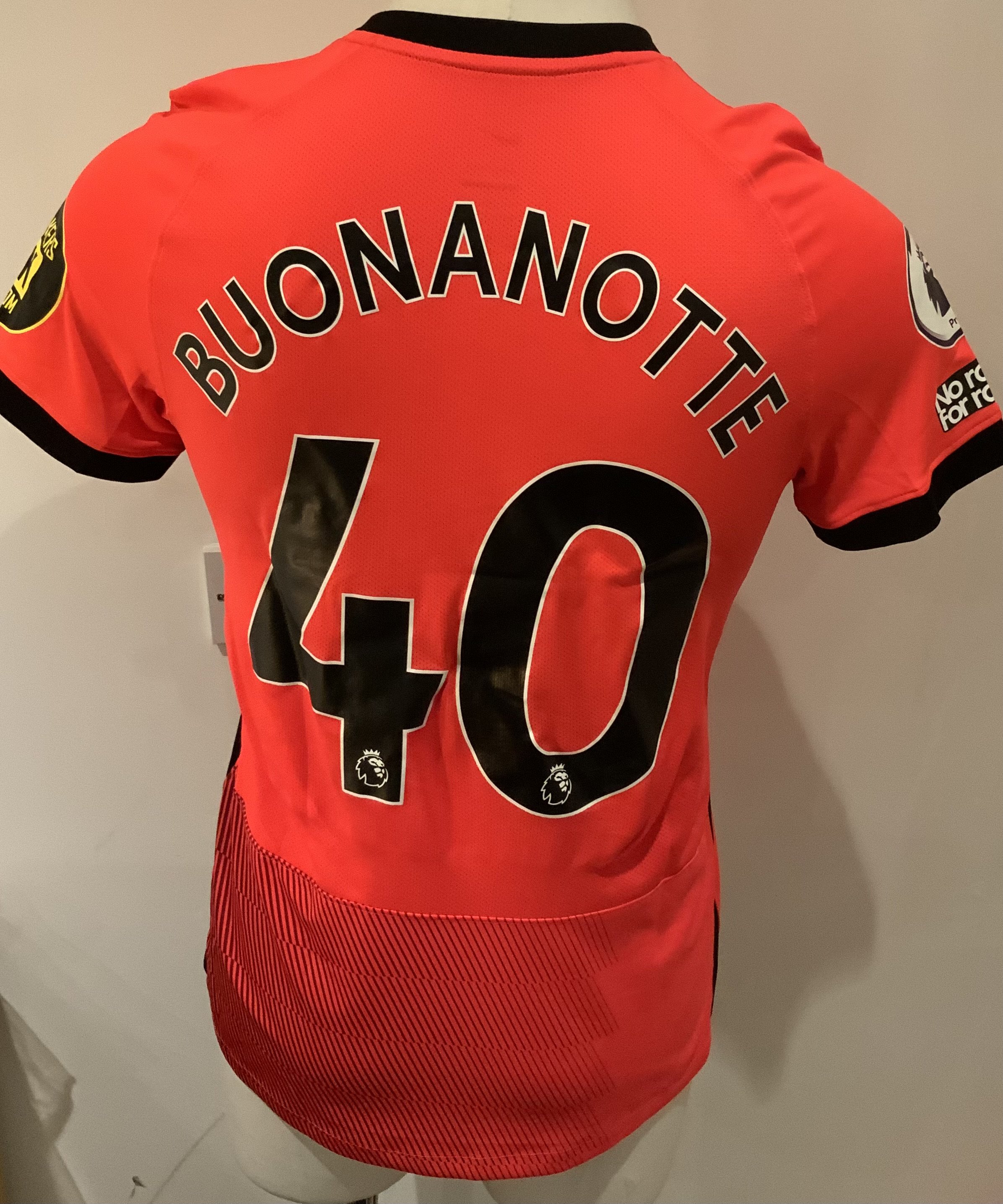Bournemouth 2022 - 2023 Match Issued Football Shirt: Red and black short sleeve shirt with Premier League badges to sleeves. Buonanotte 40 to rear. Issued v Tottenham on 8 April 2023 when player was an unused substitute. 