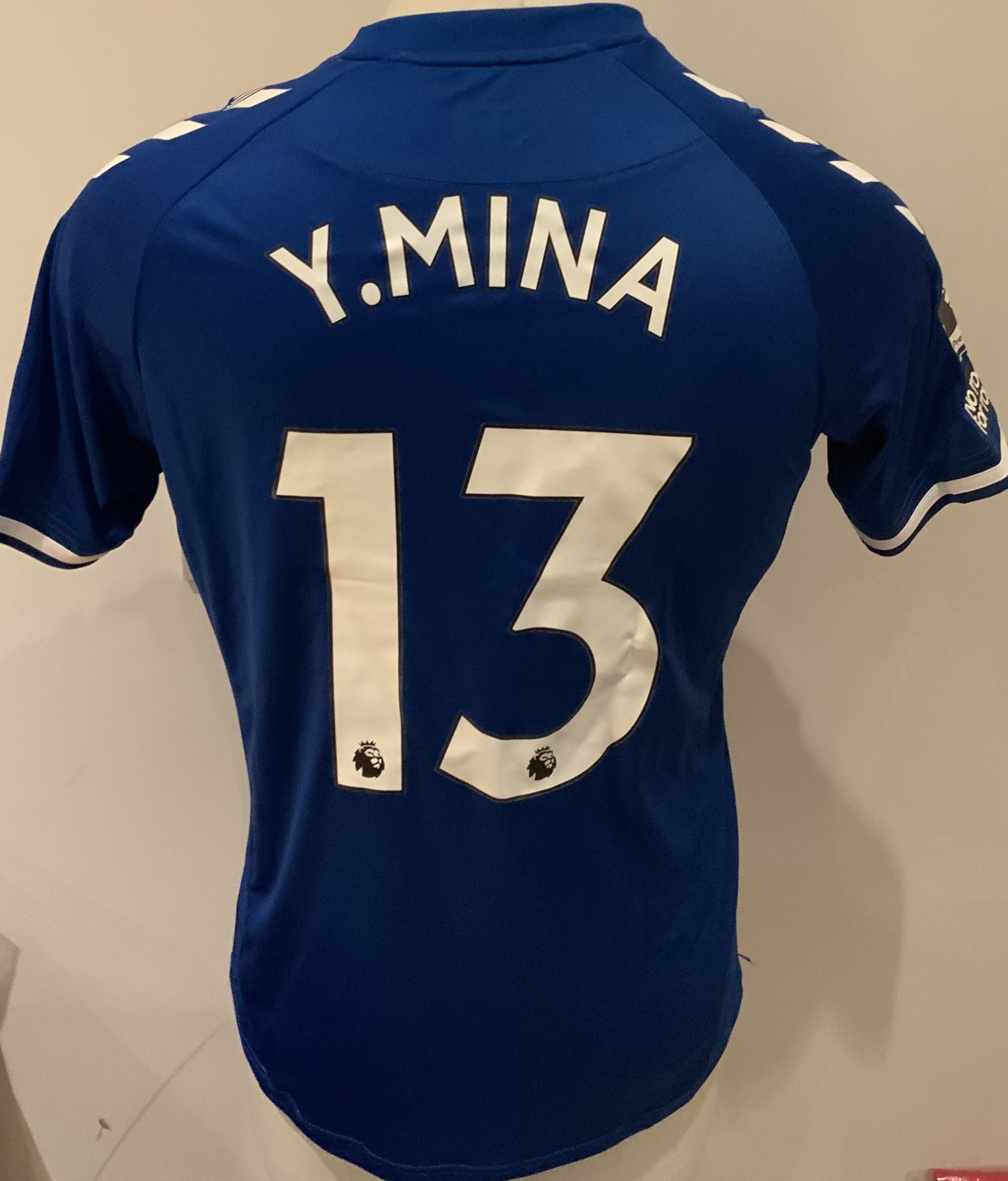 Everton 2020 - 2021 Match Worn Football Shirt: Blue short sleeve shirt with Premier League badges to sleeves. Mina 13 to rear. Worn v Tottenham on 13 September 2020. Everton won 1-0.