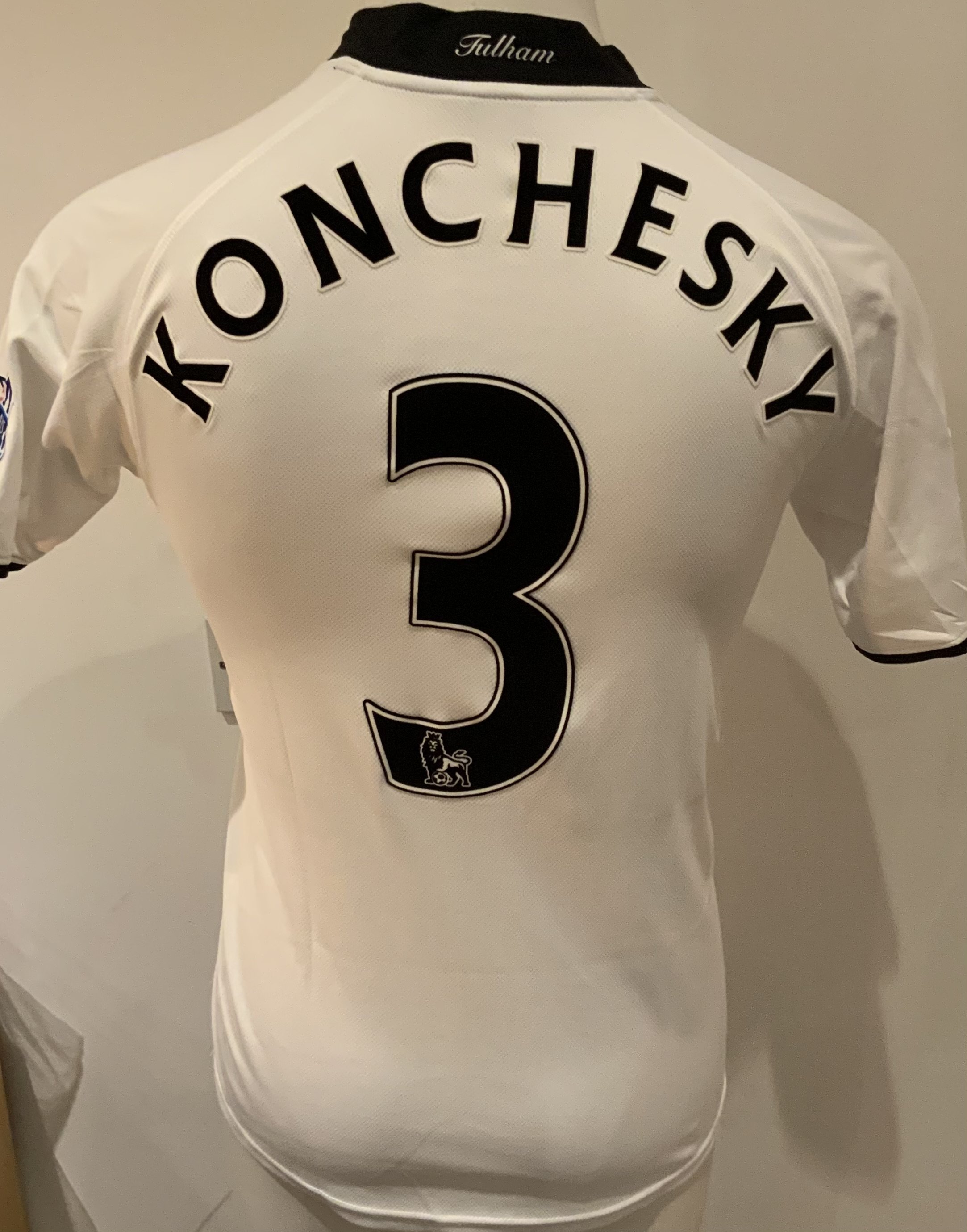 Fulham 2008 - 2009 Match Worn Football Shirt: White short sleeve shirt with Premier League badges to sleeves. Konchesky 3 to rear. Worn v Tottenham on 15 November 2008. Fulham won 2-1.