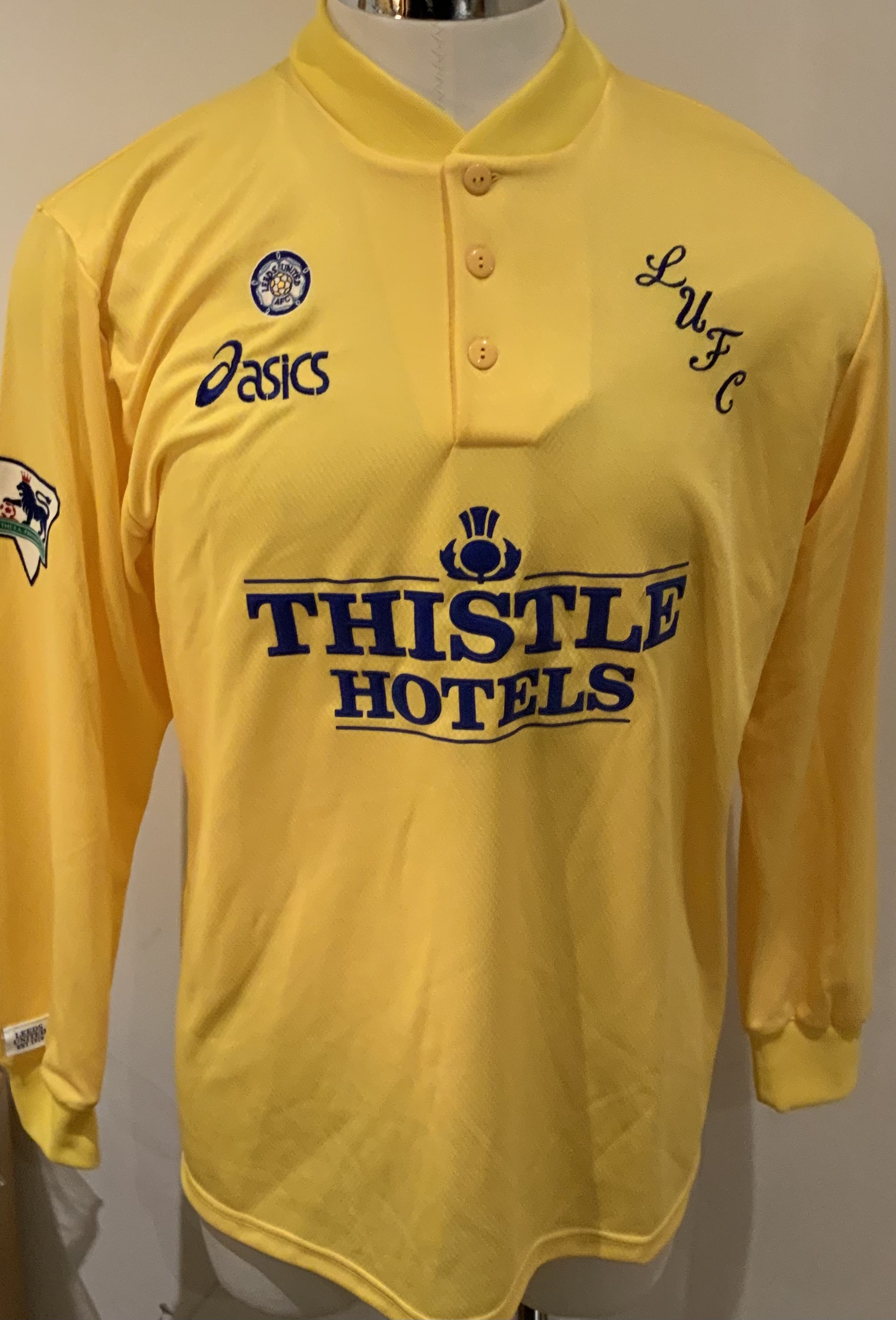 Leeds 1995 - 1996 Match Worn Football Shirt: Yellow long sleeve shirt with Premier League badges to sleeves. Number 15 to rear. Worn during the season by Nigel Worthington.