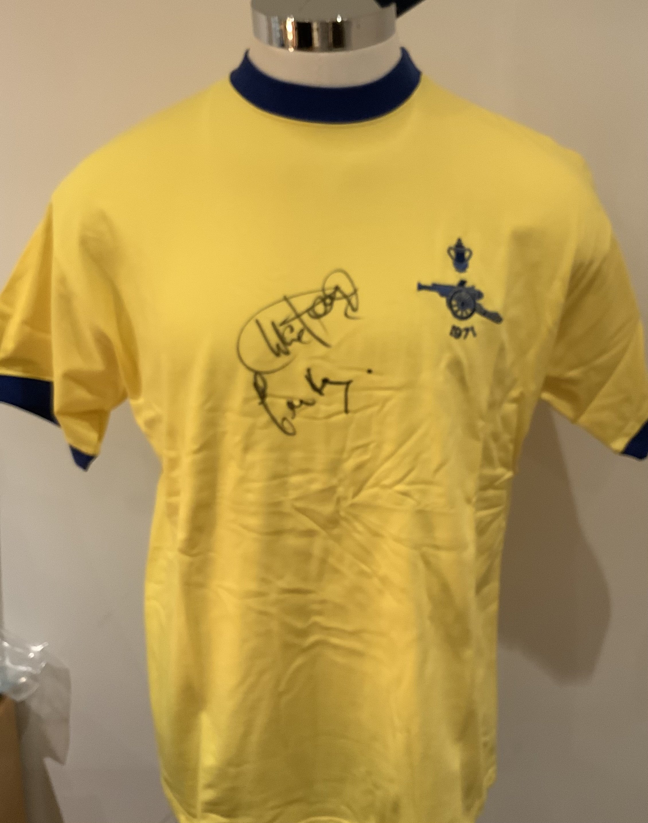 Arsenal 1971 FA Cup Final Signed Replica Shirt: Signed to front by both winning goalscorers Charlie George and Eddie Kelly. COA from reputable source. 