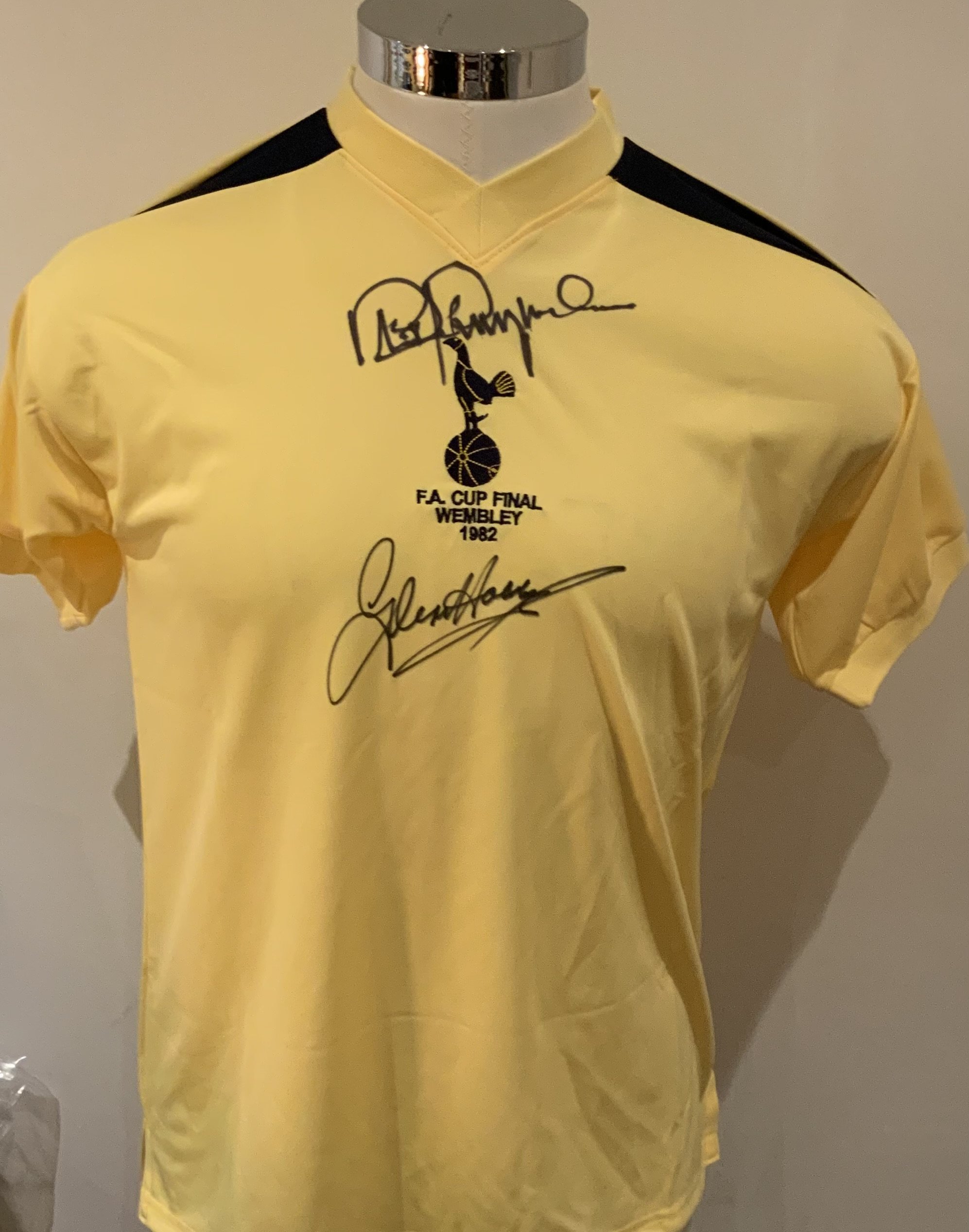 Tottenham 1982 FA Cup Final Signed Replica Shirt: Yellow short sleeve shirt signed to front by Hoddle and Perryman. COA from reputable source. 