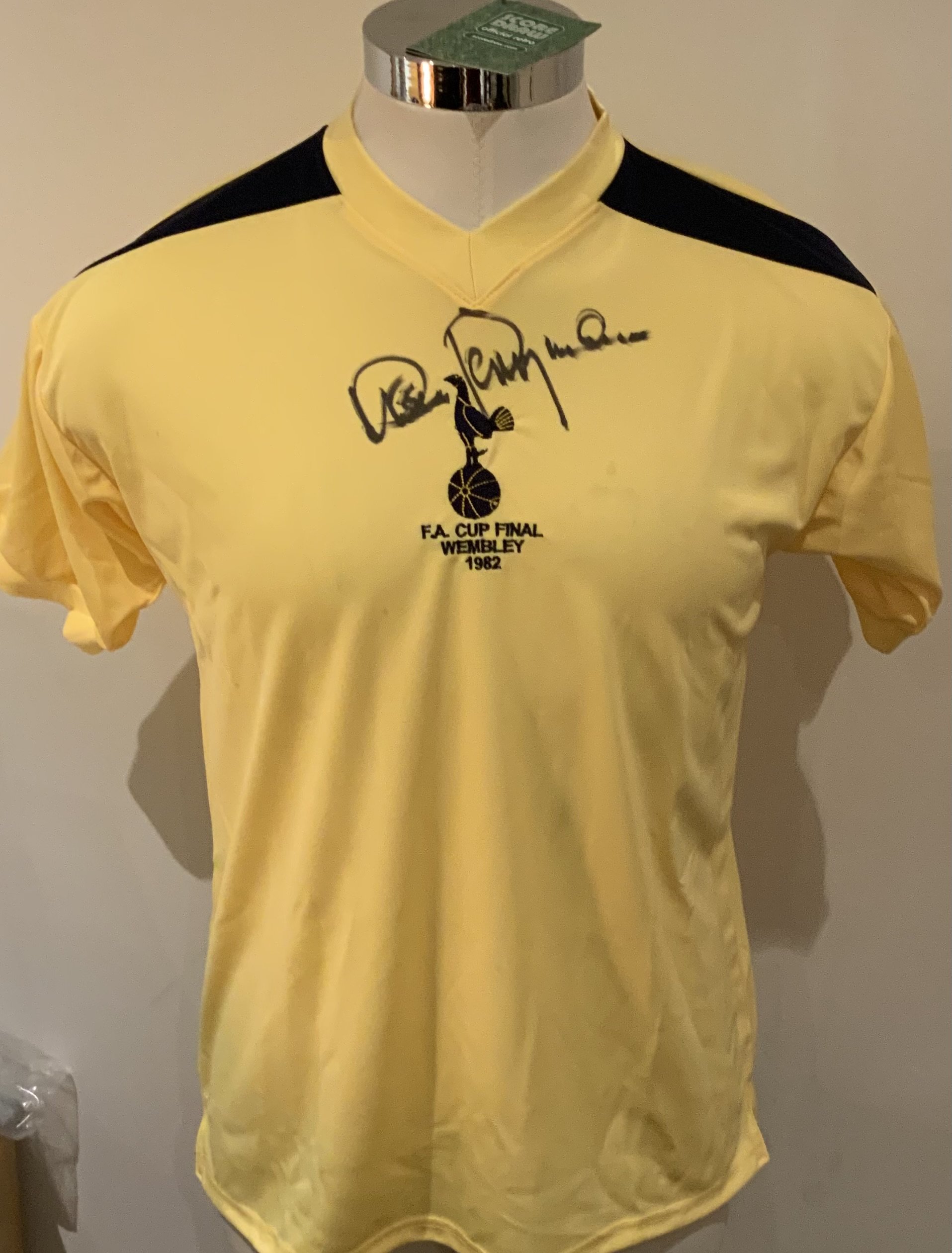 Tottenham 1982 FA Cup Final Signed Replica Shirt: Yellow short sleeve shirt signed to front by Steve Perryman. COA from reputable source. 
