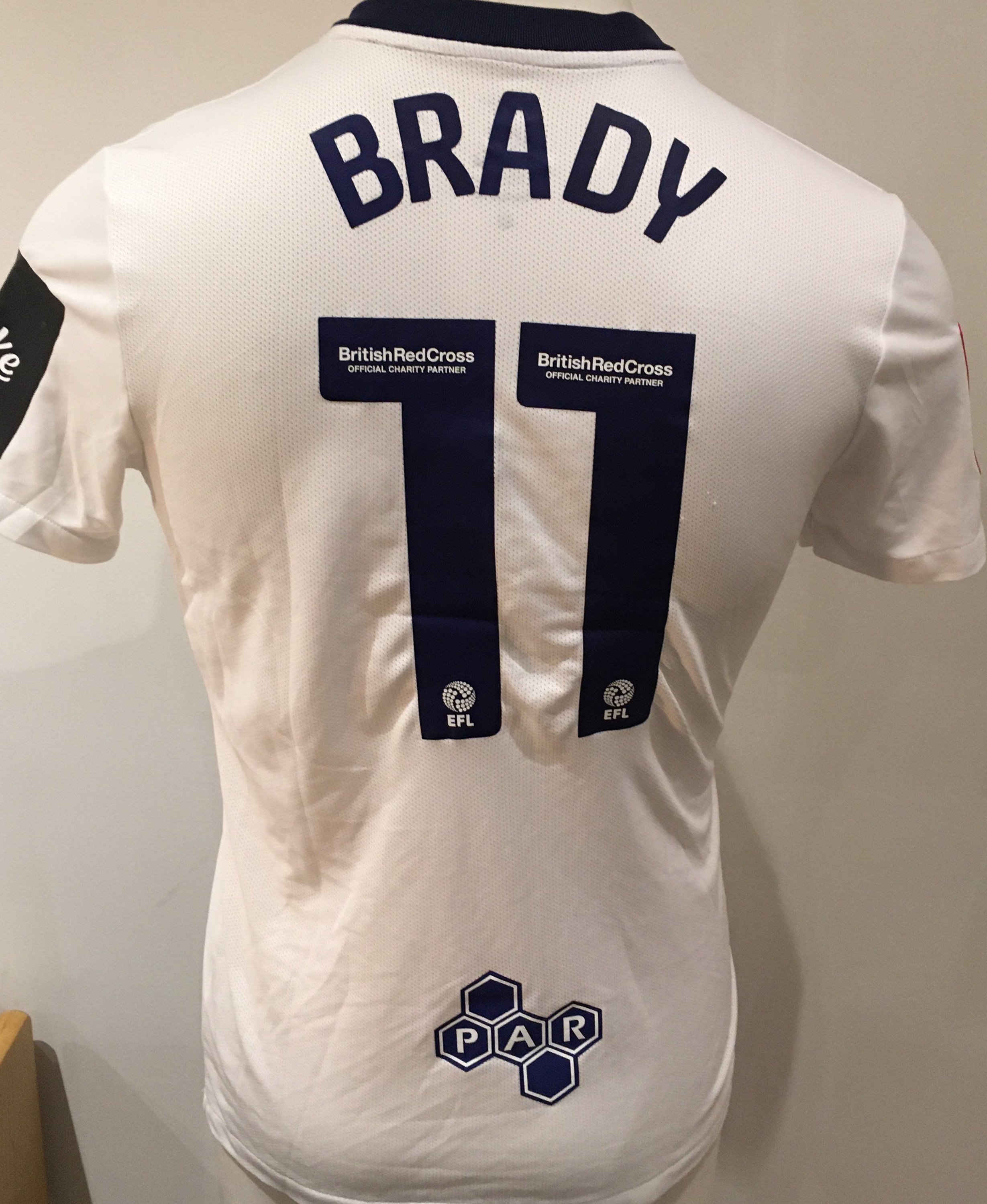 Preston 2022 - 2023 Match Worn Football Shirt: White short sleeve shirt with FA Cup badge to sleeves. Brady 11 to rear. Worn v Tottenham on 28 January 2023.