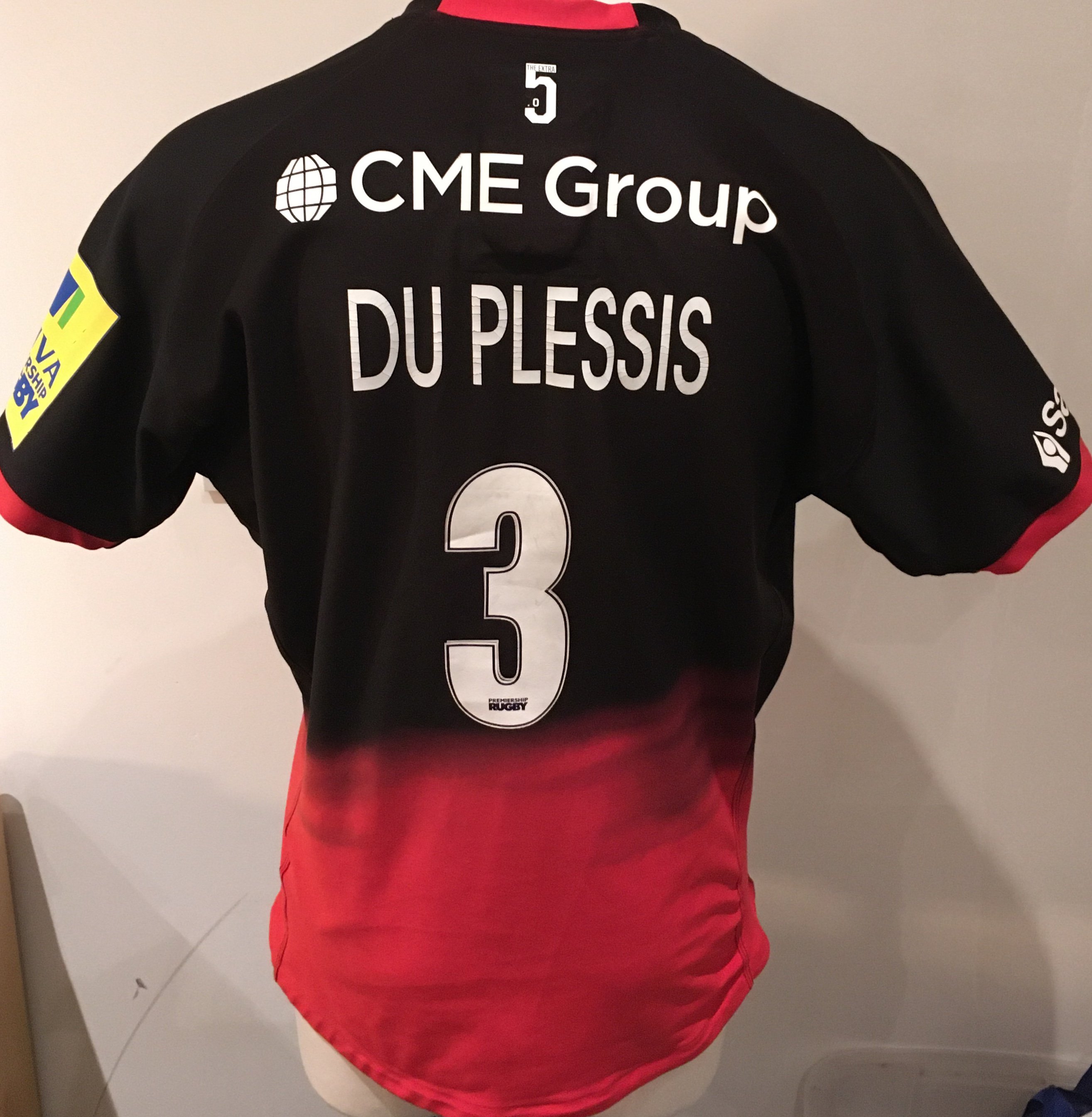 Saracens 2013 - 2014 Home Match Worn Rugby Union Football Shirt: Black short sleeve Nike XXL excellent condition shirt worn by Petrus Du Plessis . Aviva Premiership badging. GPS tracking pocket present at neck.
