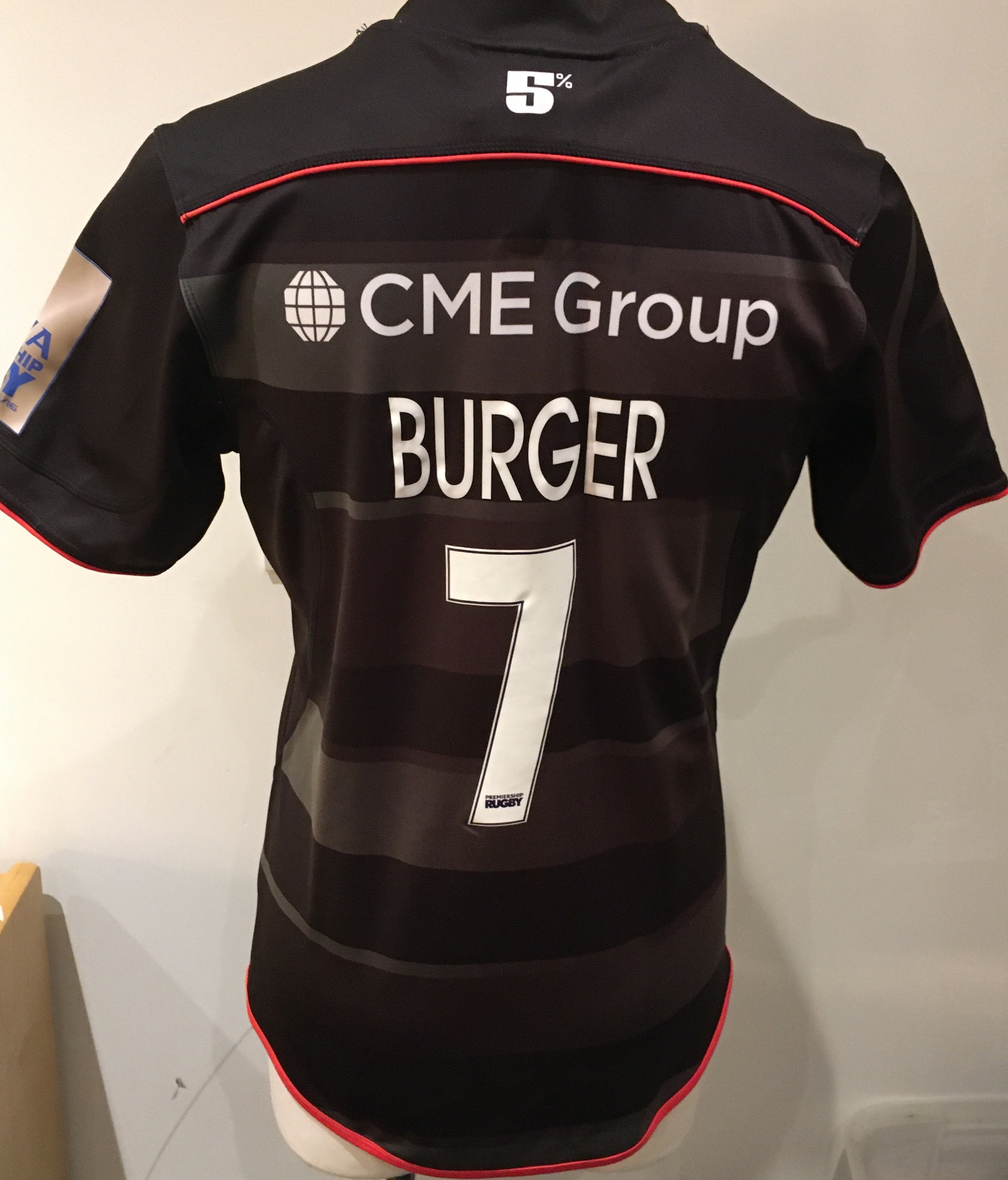 Saracens 2016 - 2017 Home Match Worn Rugby Union Football Shirt: Black short sleeve BLK large excellent condition shirt worn by Jacques Burger. Aviva Champions 2015/16 badging. GPS tracking pocket present at neck.
