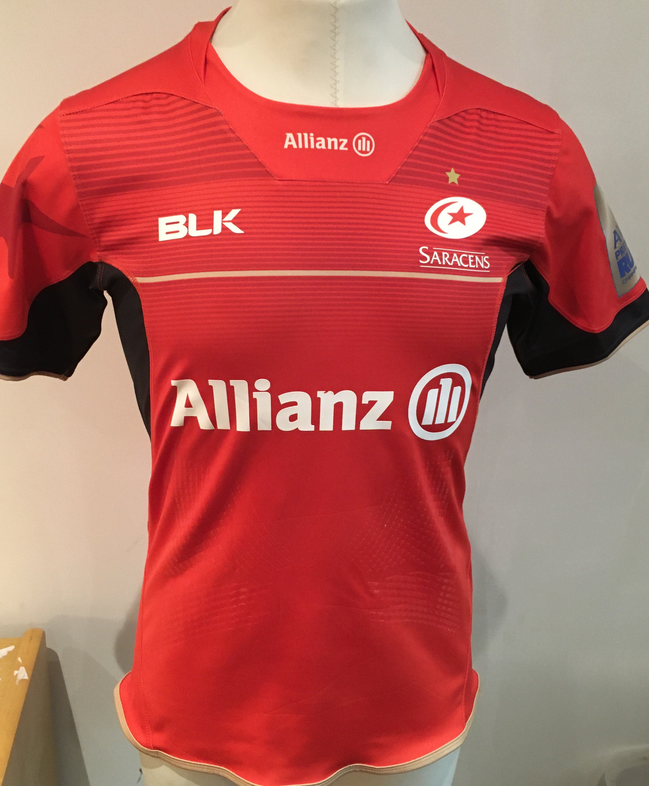 Saracens 2016 - 2017 Away Match Worn Rugby Union Football Shirt: Red short sleeve BLK large excellent condition shirt worn by Nick Tompkins. Aviva Champions 2015/16 badging. GPS tracking pocket present at shirt neck.