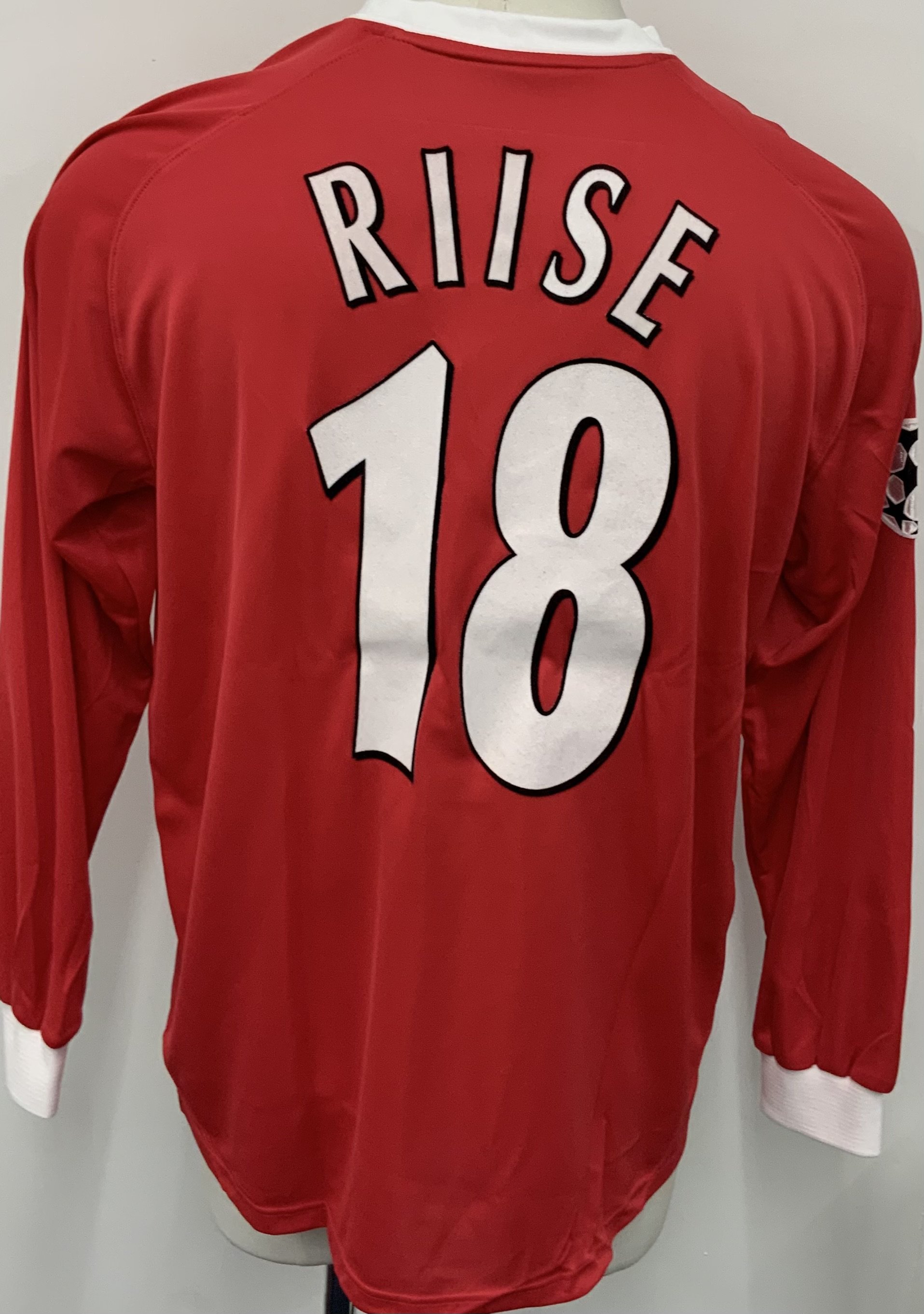 Liverpool 2001 - 2002 Home Match Worn Football Shirt: Red long sleeve Reebok shirt with Champions League badging to sleeve. Riise 18 to rear. Worn v Boavista on 24 October 2001. Comes with signed COA from the player. 