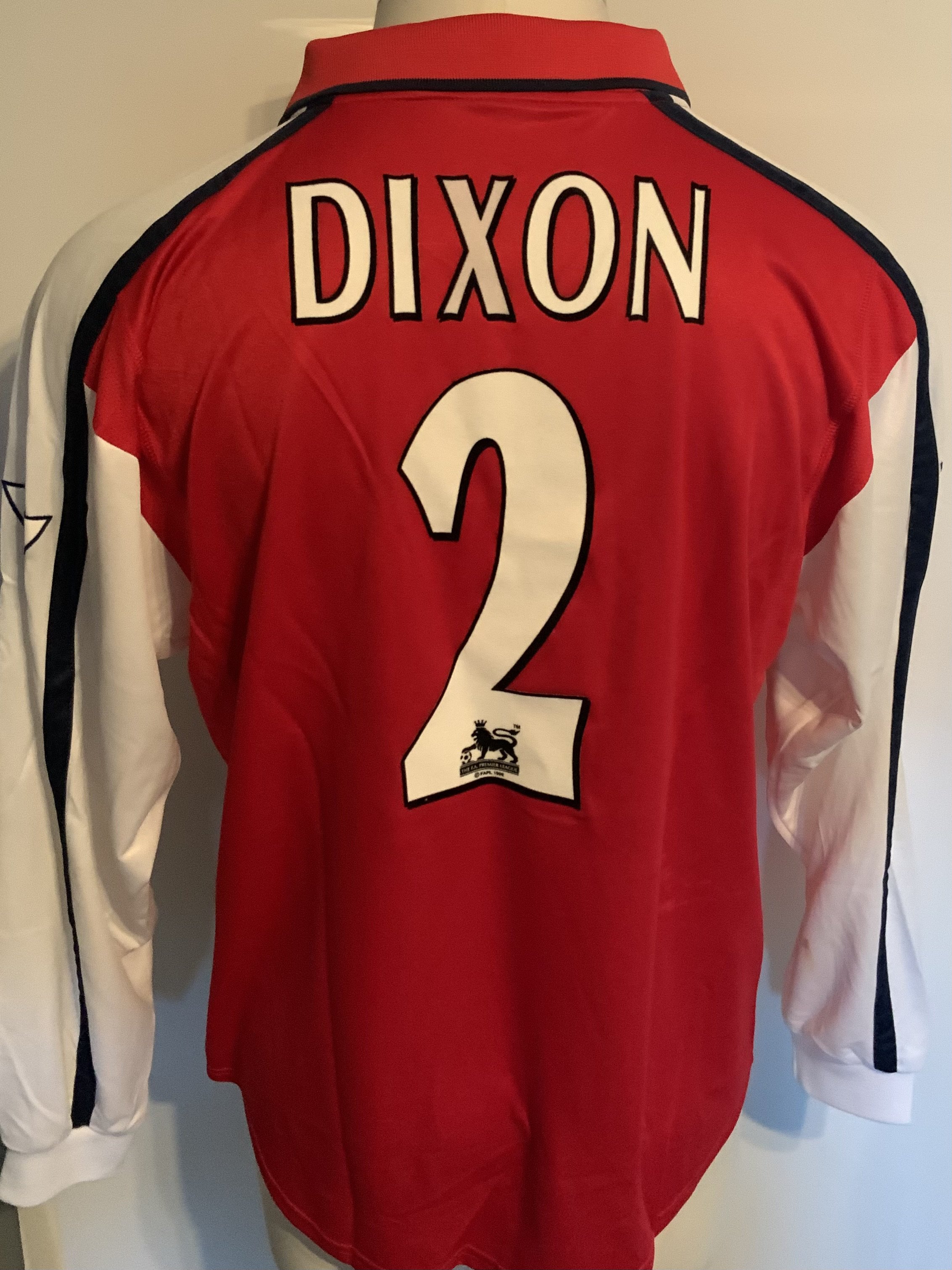 Arsenal 2000 - 2001 Home Match Worn Football Shirt: Red and white long sleeve  unwashed Nike shirt with Premier League badging to sleeves. Dixon 2 to rear. Worn v Chelsea on 18 February 2001. Comes with signed COA from the player who was captain on the day.