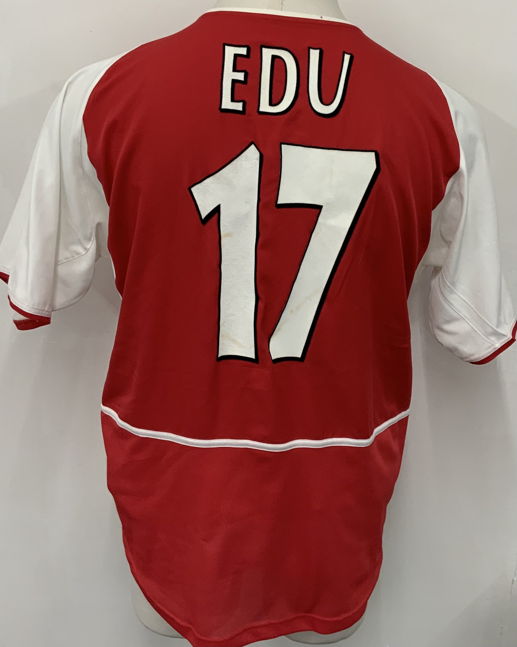 Arsenal 2002 - 2003 Home Match Worn Football Shirt: Red and white short sleeve  Nike shirt with Champions League badging to sleeve. Edu 17 to rear.