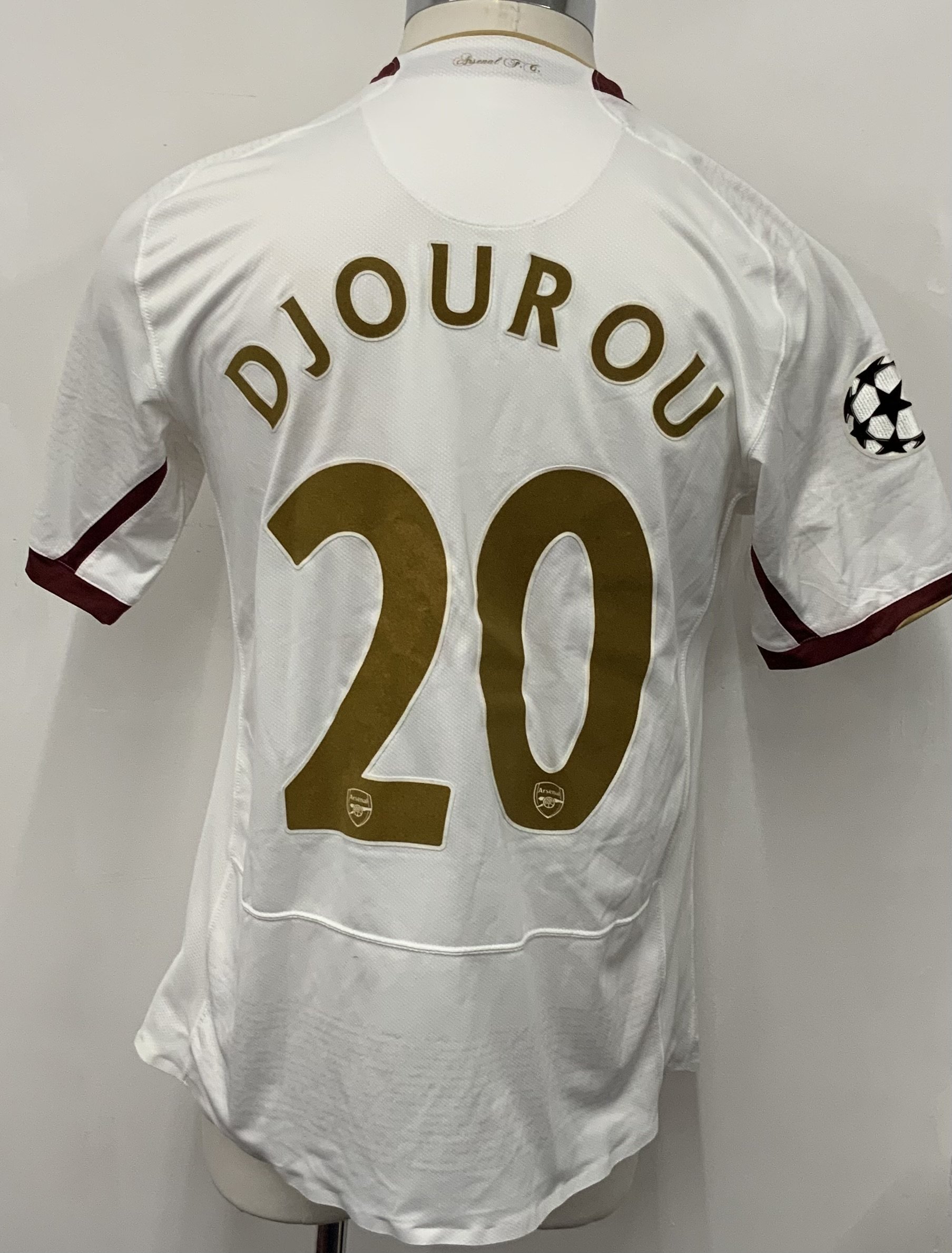 Arsenal 2007 - 2008 Home Match Worn Football Shirt:  White short sleeve Nike shirt with Champions League badging to sleeves. Djourou 20 to rear.