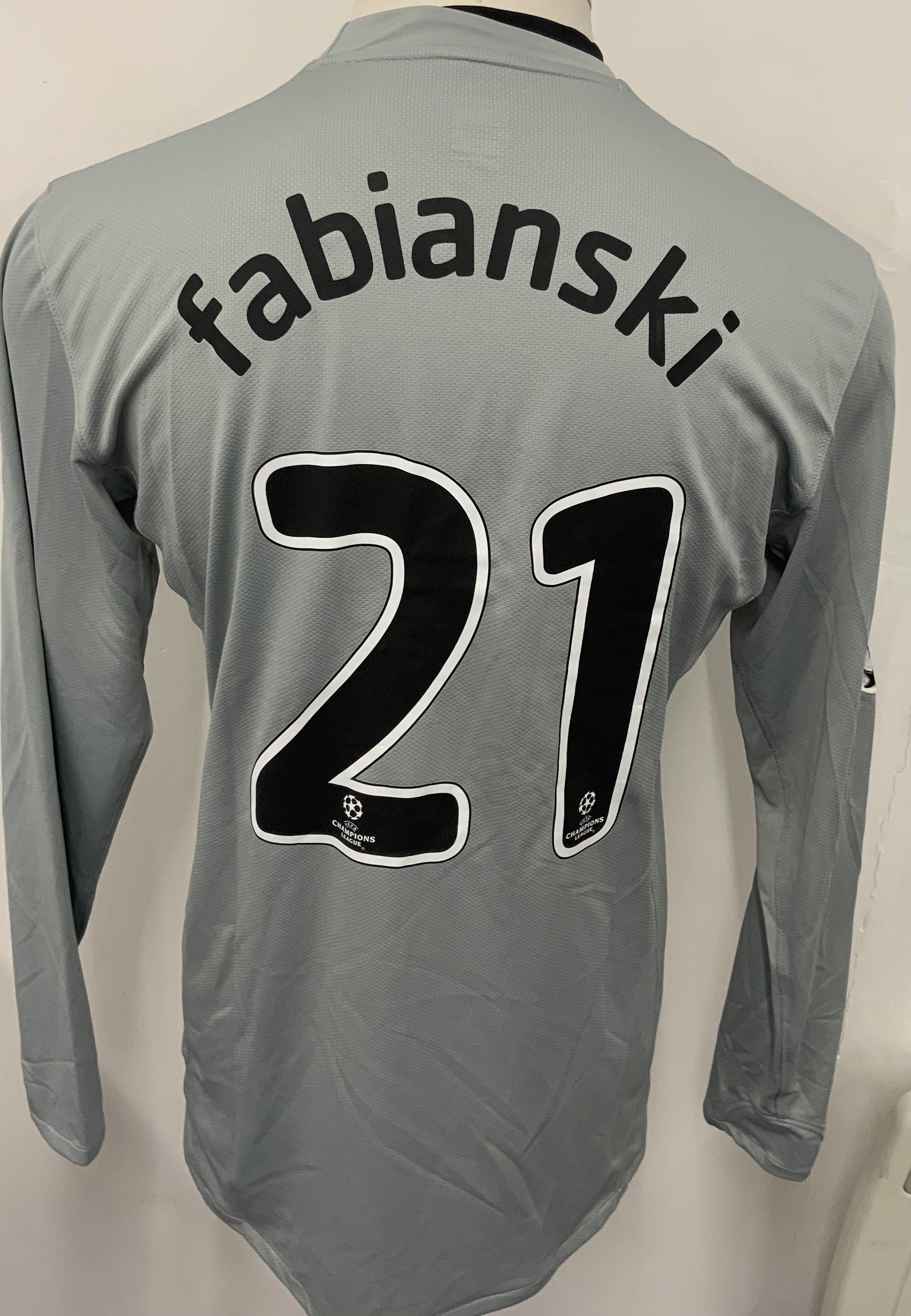 Arsenal 2008 - 2009 Match Worn Goalkeepers Football Shirt: Grey long sleeve Nike goalkeeper shirt with Champions League badging to sleeves. Fabianski 21 to rear. 