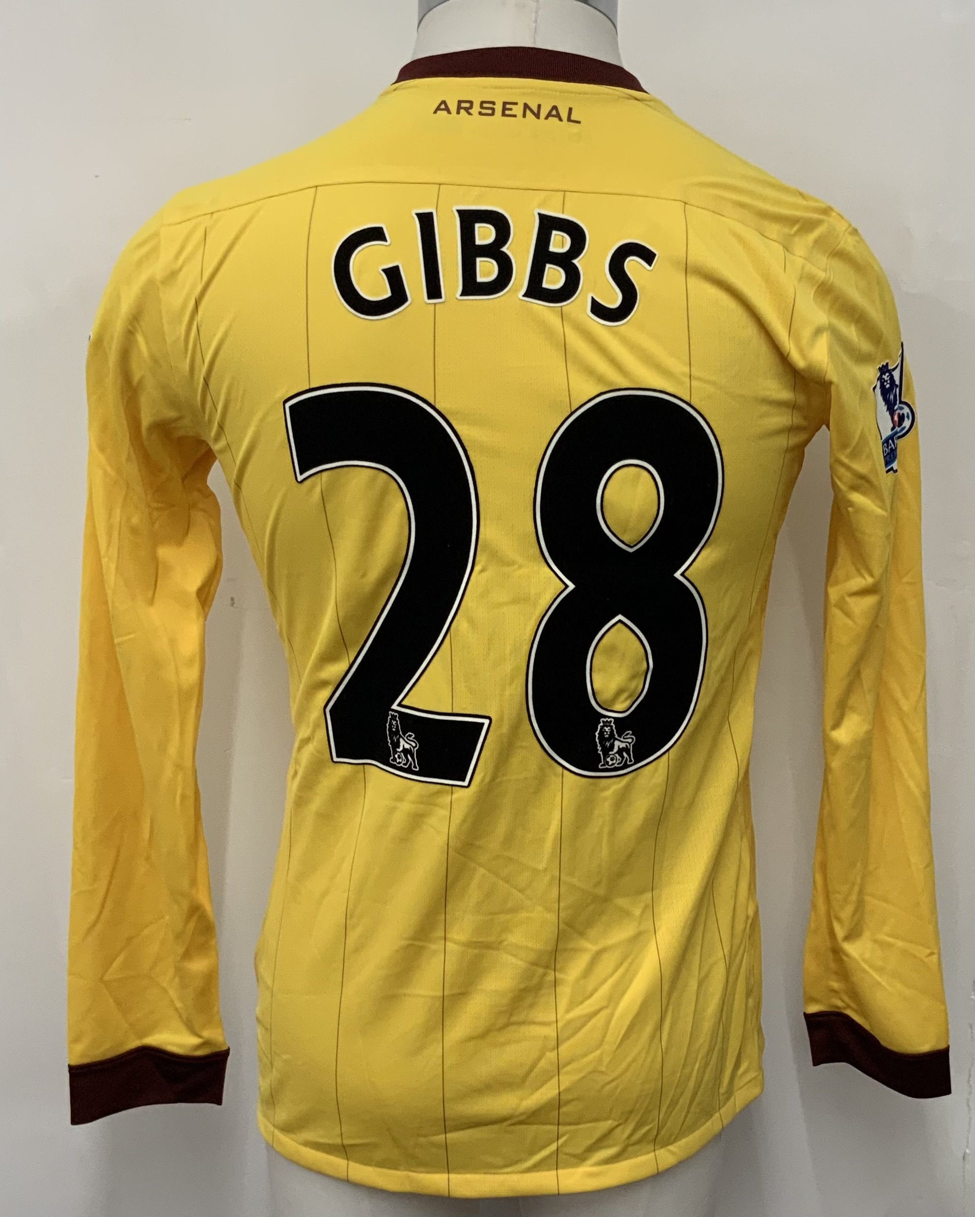 Arsenal 2006 - 2008 Away Match Worn Football Shirt: Yellow long sleeve Nike shirt with Premier League badging to sleeves. Gibbs 28 to rear.