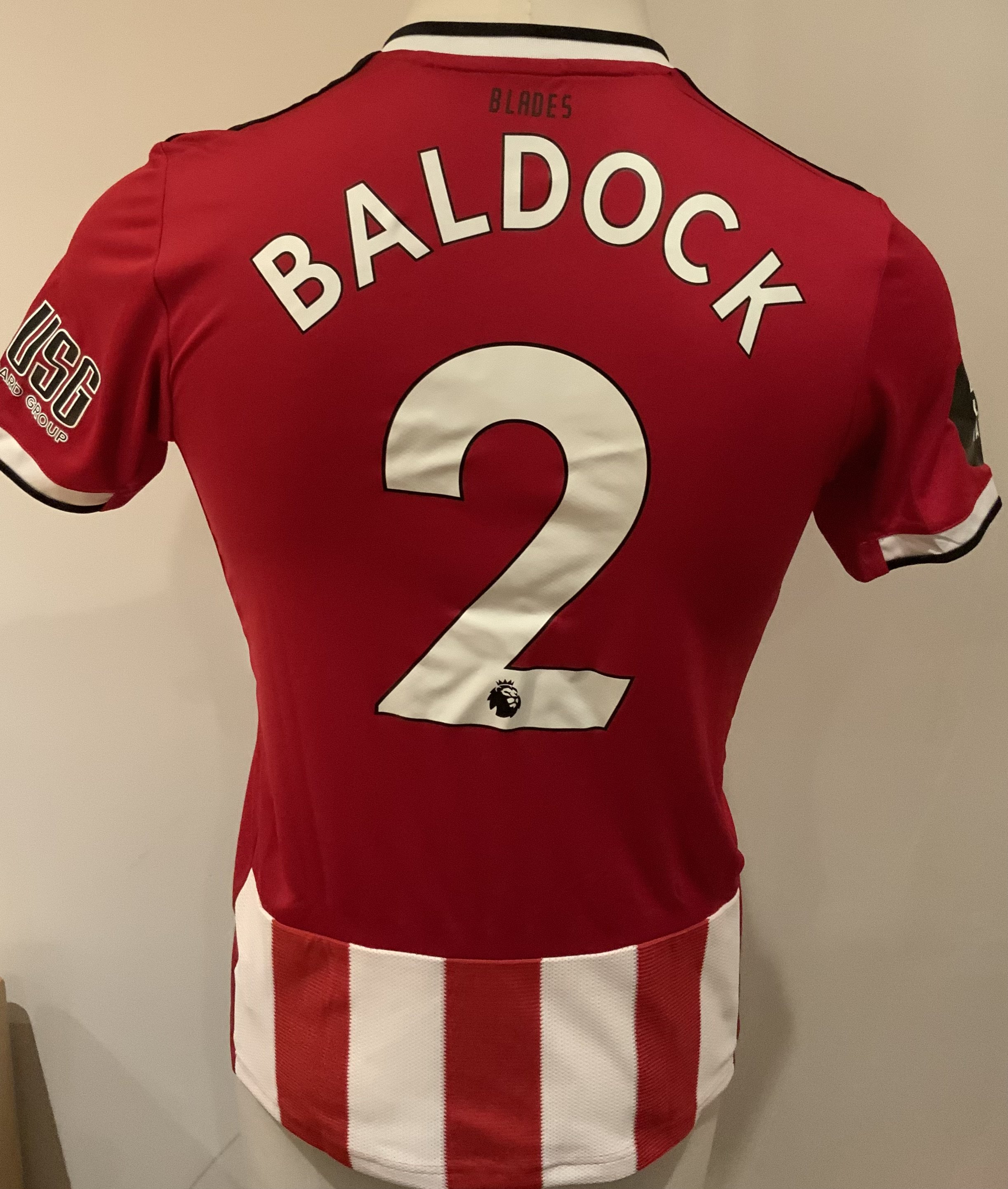 Sheffield United 2020 - 2021 Match Worn Football Shirt: Red and white short sleeve shirt with Black Lives badge to sleeve. Baldock 2 to rear. Worn v Tottenham on 2 May 2021.