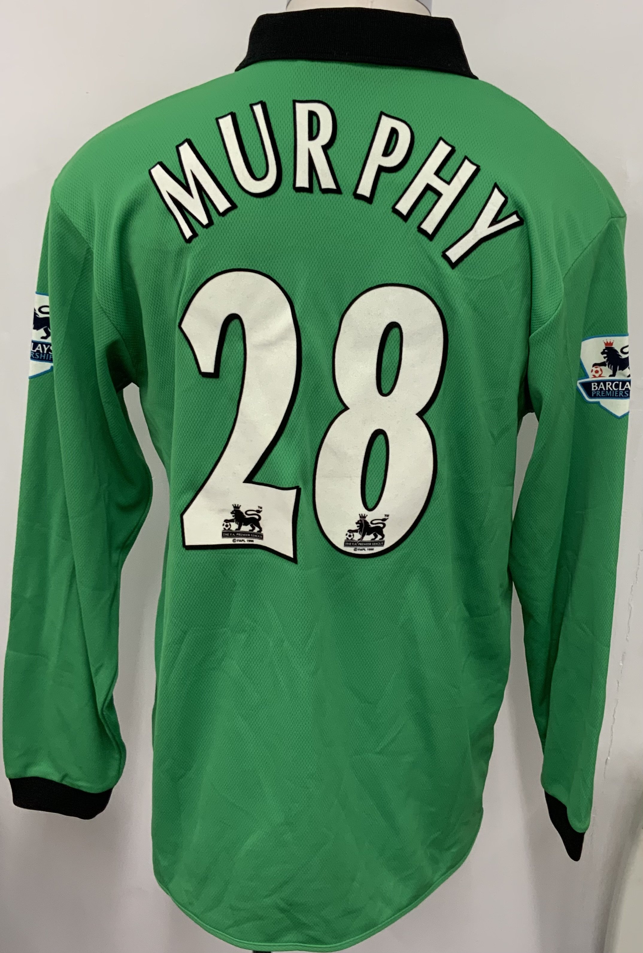West Brom 2004 - 2005 Match Worn Football Shirt: Green long sleeve shirt with number 28 Murphy to rear. Premier League badging to sleeves. Signed to front by the player. 