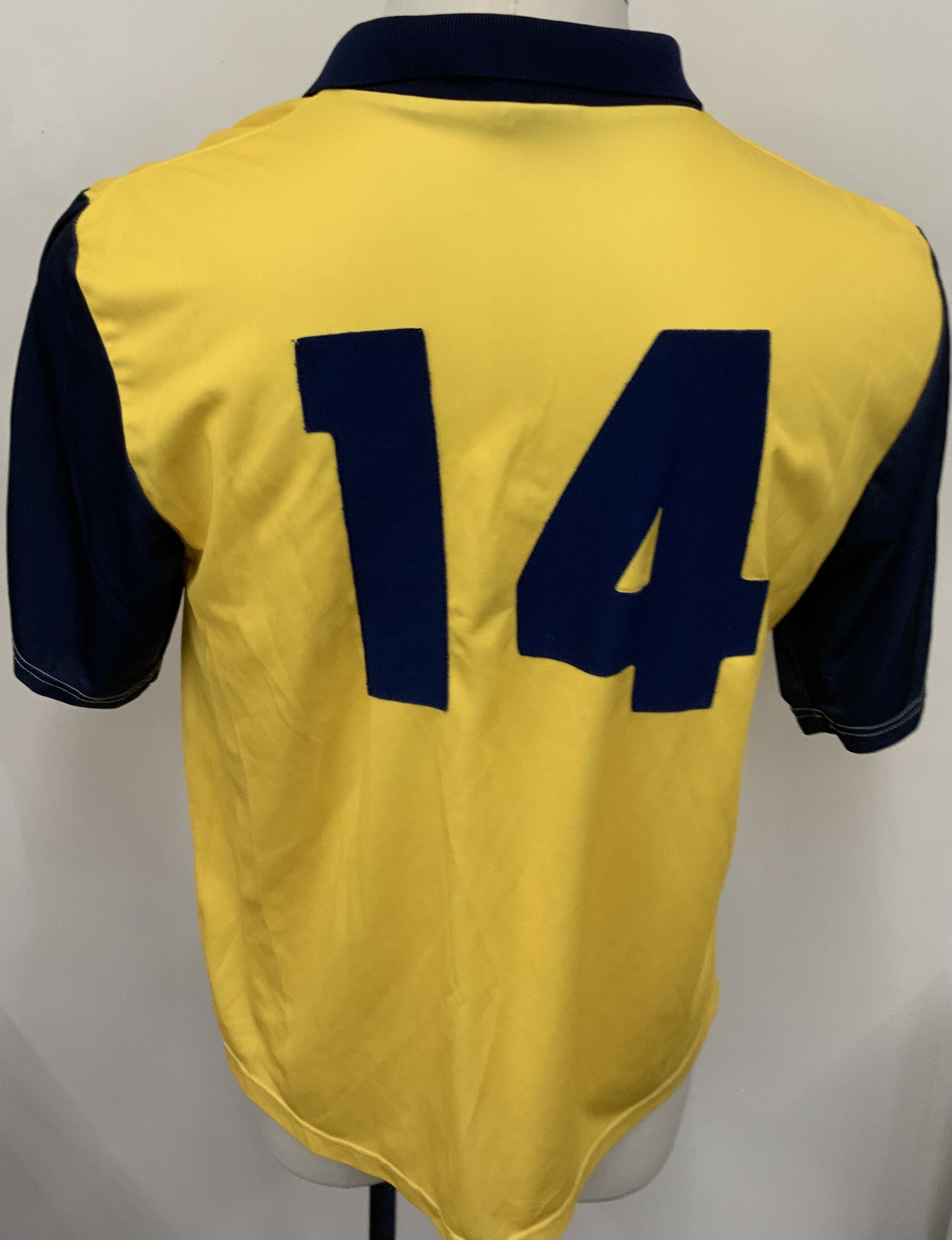 Colchester United 1997  - 1998 Match Worn Football Shirt: Yellow short sleeve shirt with Nationwide League badging to sleeves. Number 14 to rear. Worn by Steve Forbes and signed by him to front. 