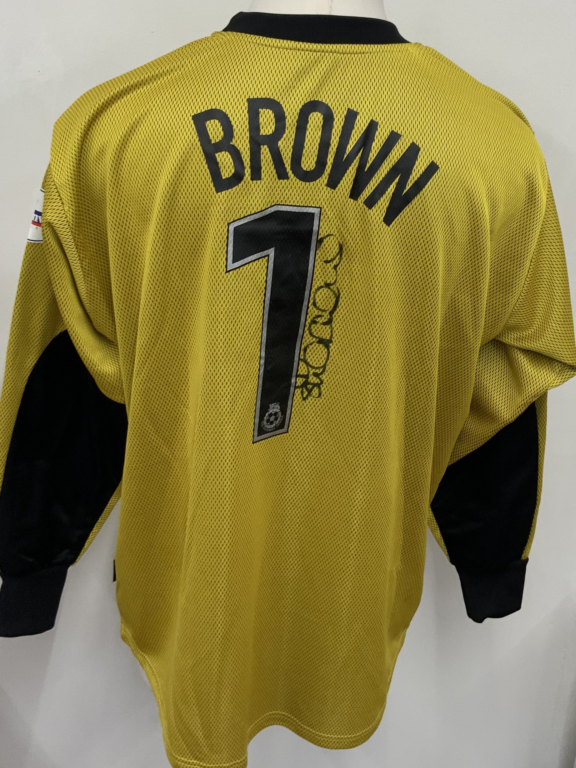 Colchester United 2002  - 2003 Match Worn Football Shirt: Yellow long sleeve goalkeepers shirt with Nationwide League badging to sleeves. Brown 1 to rear.