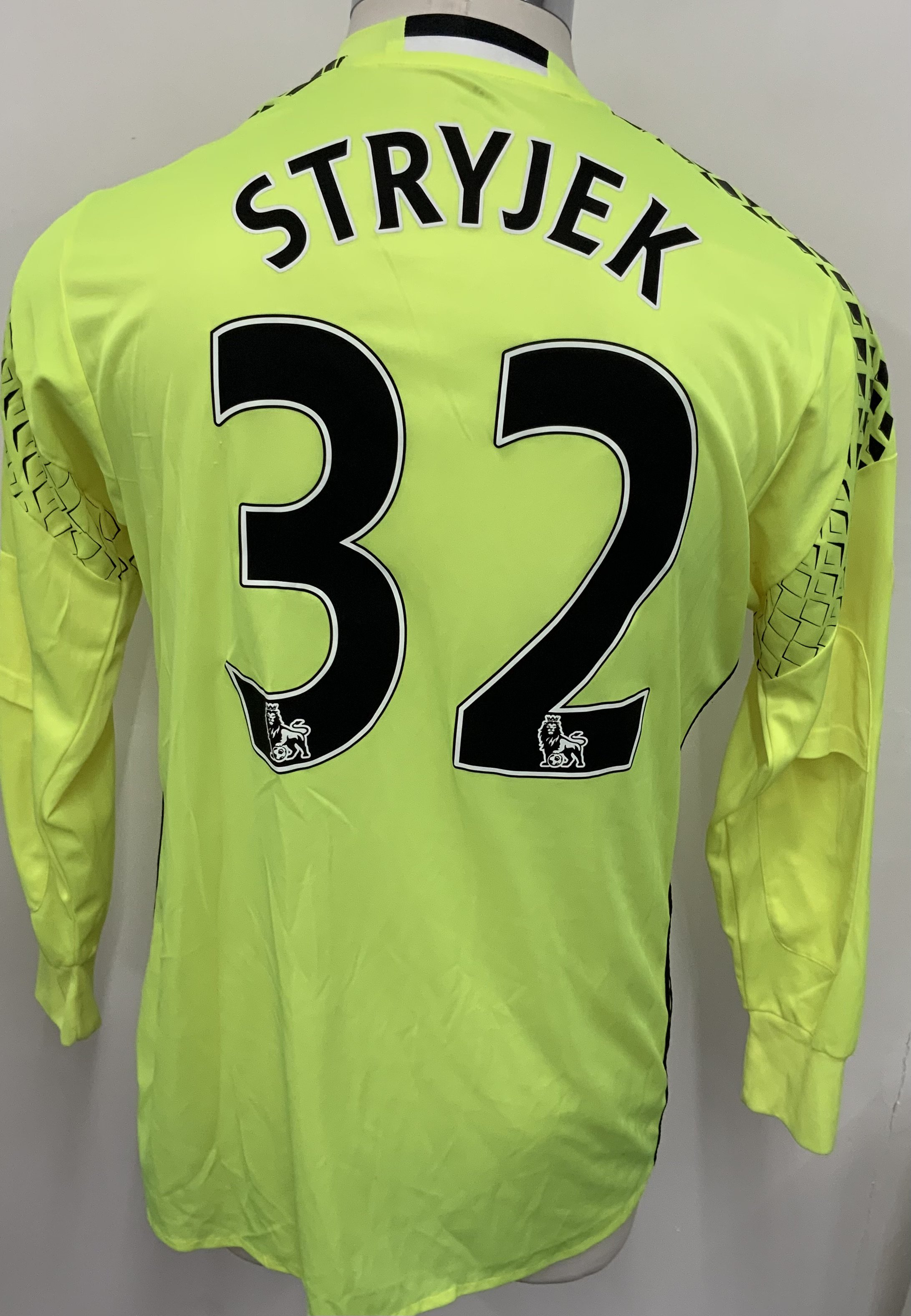 Sunderland 2016 - 2017 Match Issued Football Shirt: Yellow long sleeve goalkeepers shirt with Premier League badging to sleeves. Stryjek 32 to rear.  Signed by and issued to Stryjek in the Premier League International Cup Final VS FC Porto at the Stadium Of Light on 17 5 2017.
